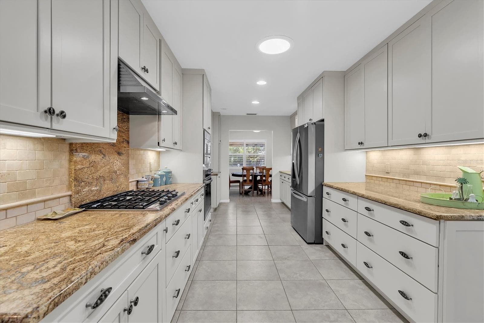 The home has several Sola Tube skylights to lower your energy costs. - 7106 PALM DR, HOLMES BEACH