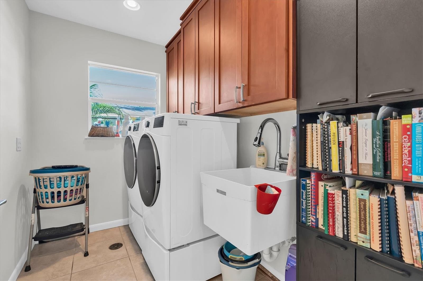 Good sized laundry room could be converted to a half bath. LG washer and dryer were new in 5/25. - 7106 PALM DR, HOLMES BEACH
