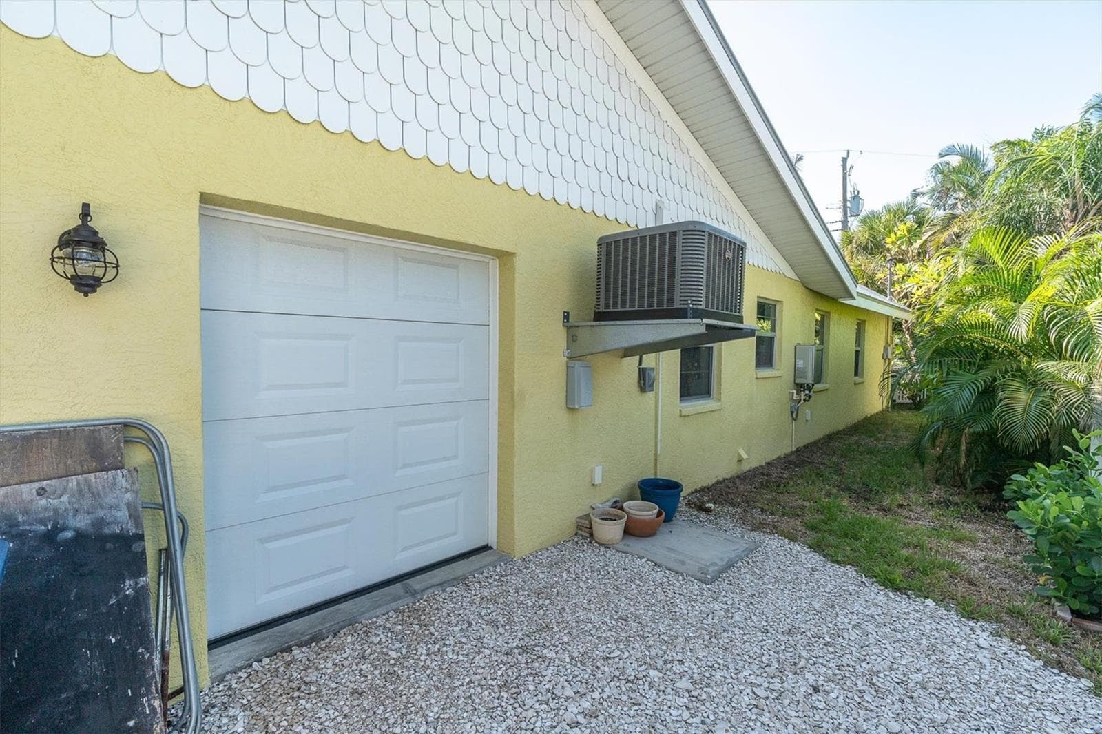 Golf cart garage. On demand hot water heater new 7/25. - 7106 PALM DR, HOLMES BEACH