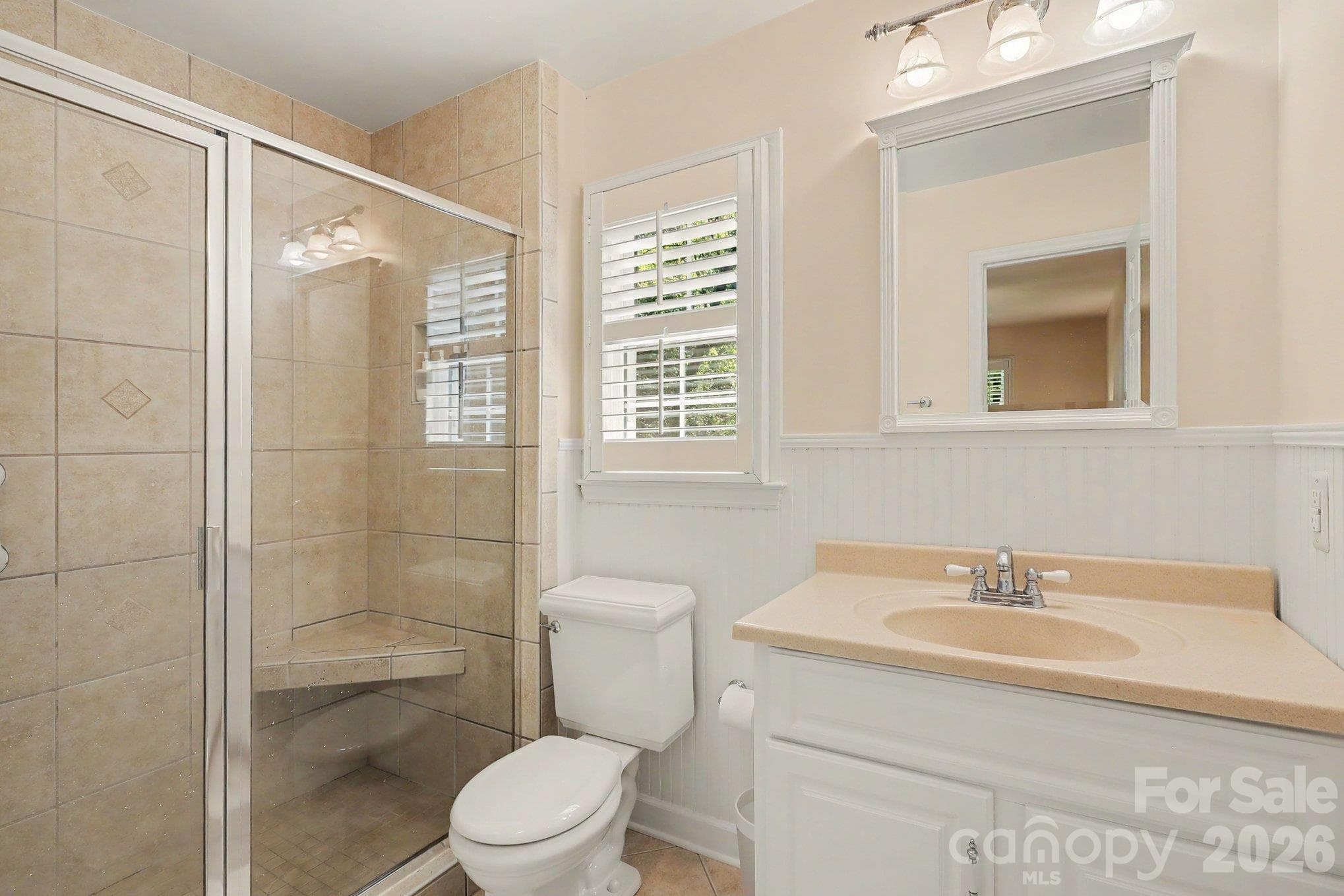 En suite primary bathroom with neutral finishes. - 640 Heather Lane, Charlotte