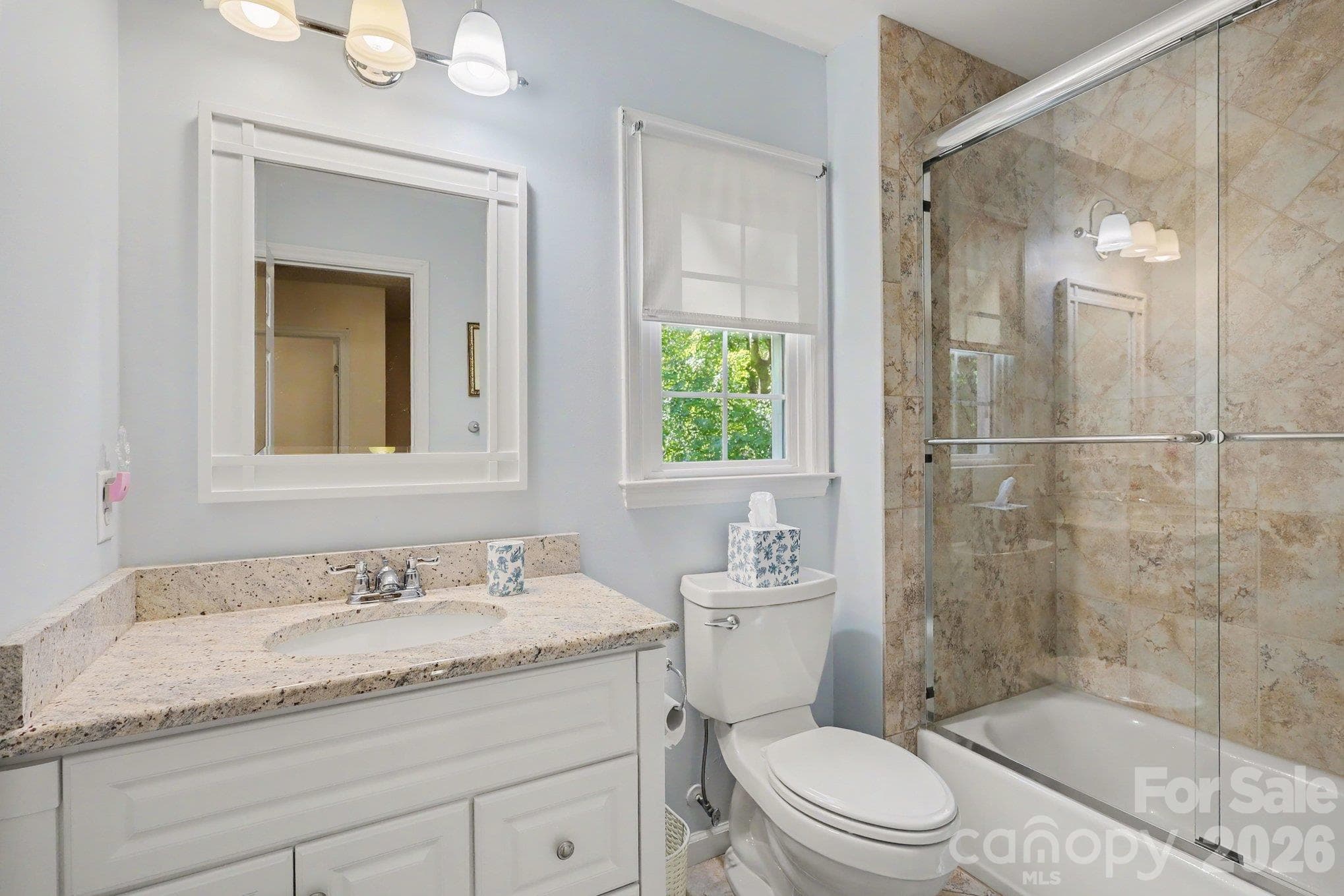 Full bathroom to service the second and third bedrooms. - 640 Heather Lane, Charlotte
