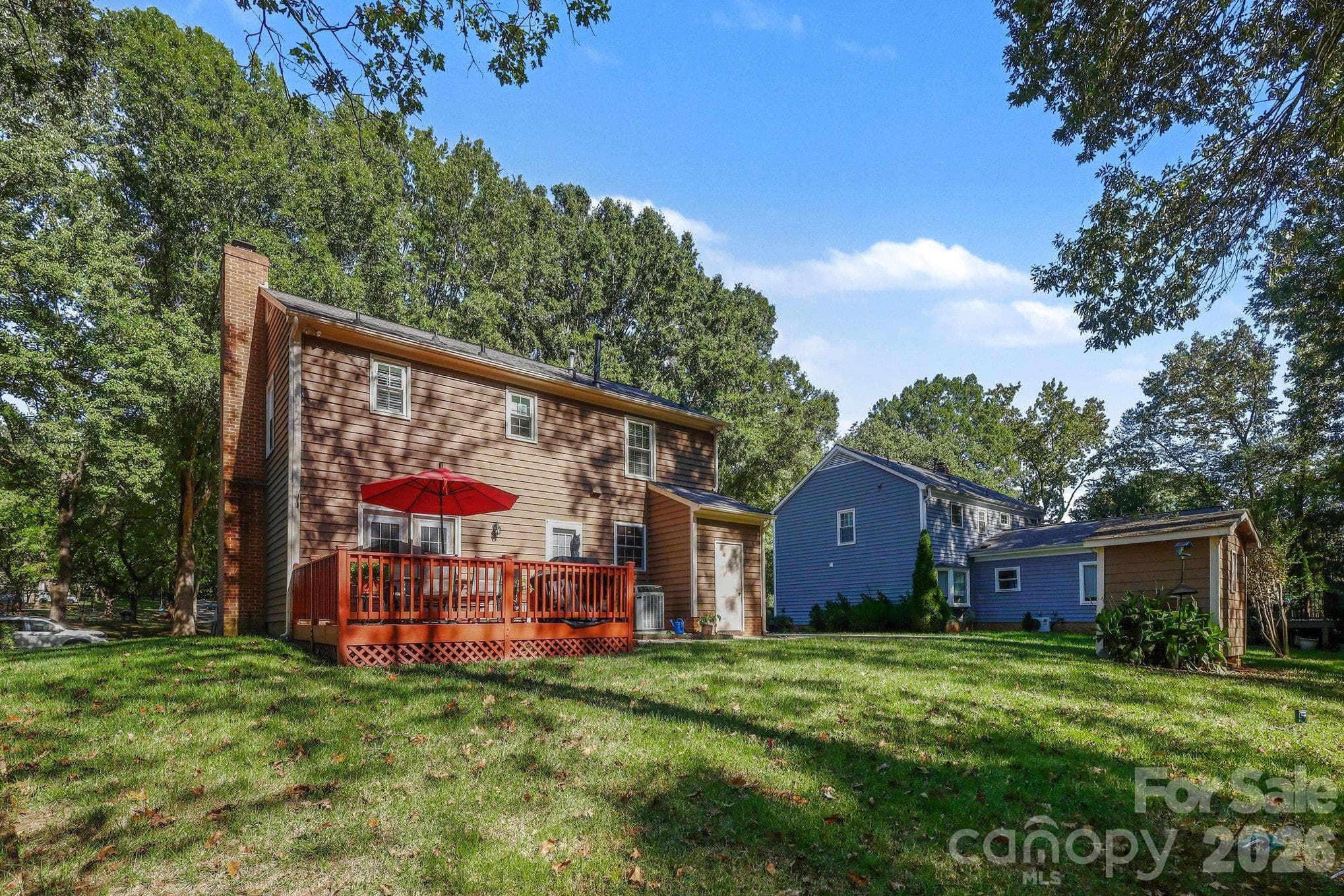 Backyard landscape is created by the trees and wildlife lining the Little Hope Creek nature area. Note: it is not part of the pedestrian greenway. - 640 Heather Lane, Charlotte