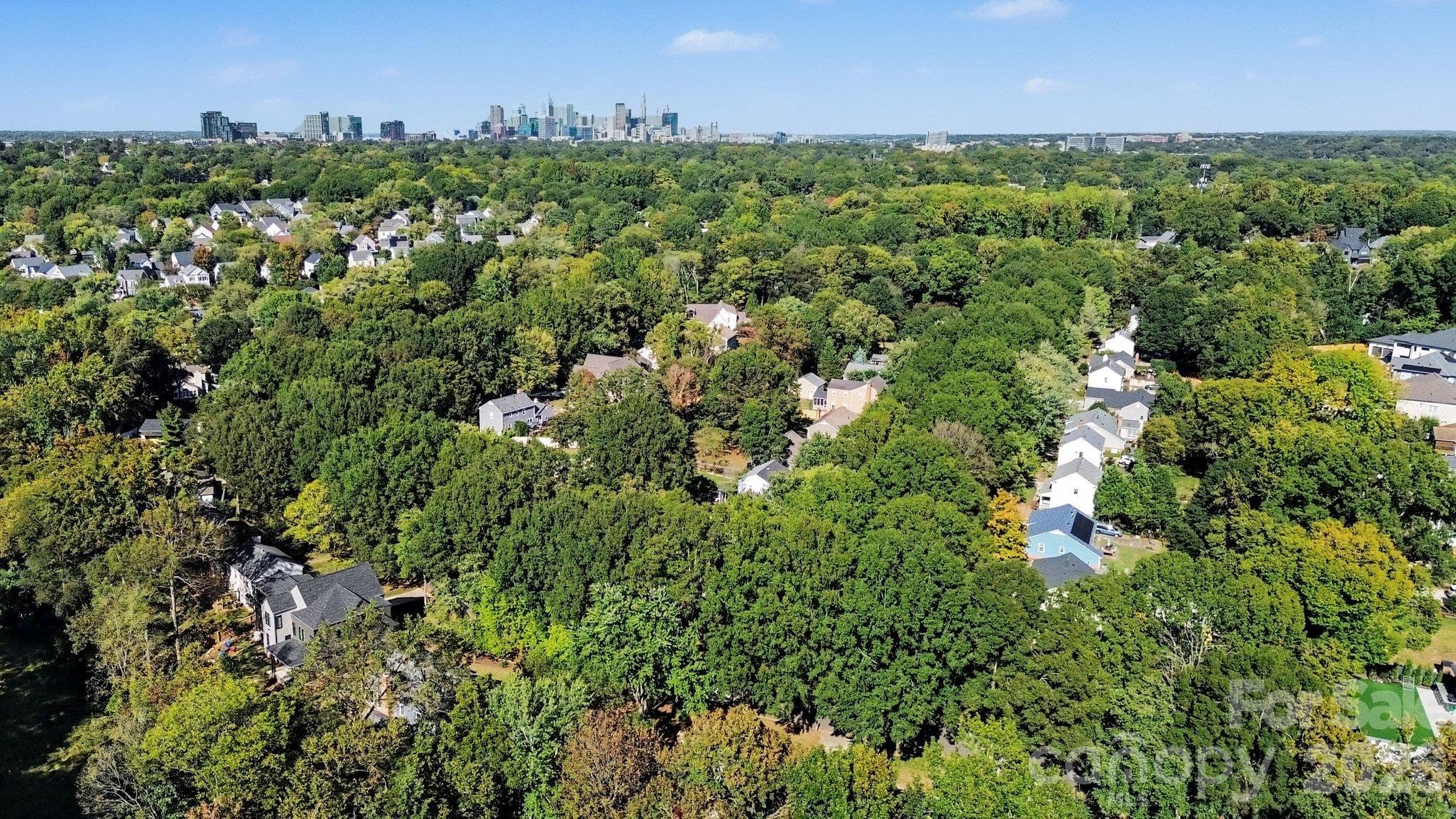 This home is convenient to Uptown (skyline in pic), SouthPark, and the Charlotte-Douglas International Airport to name a few. - 640 Heather Lane, Charlotte
