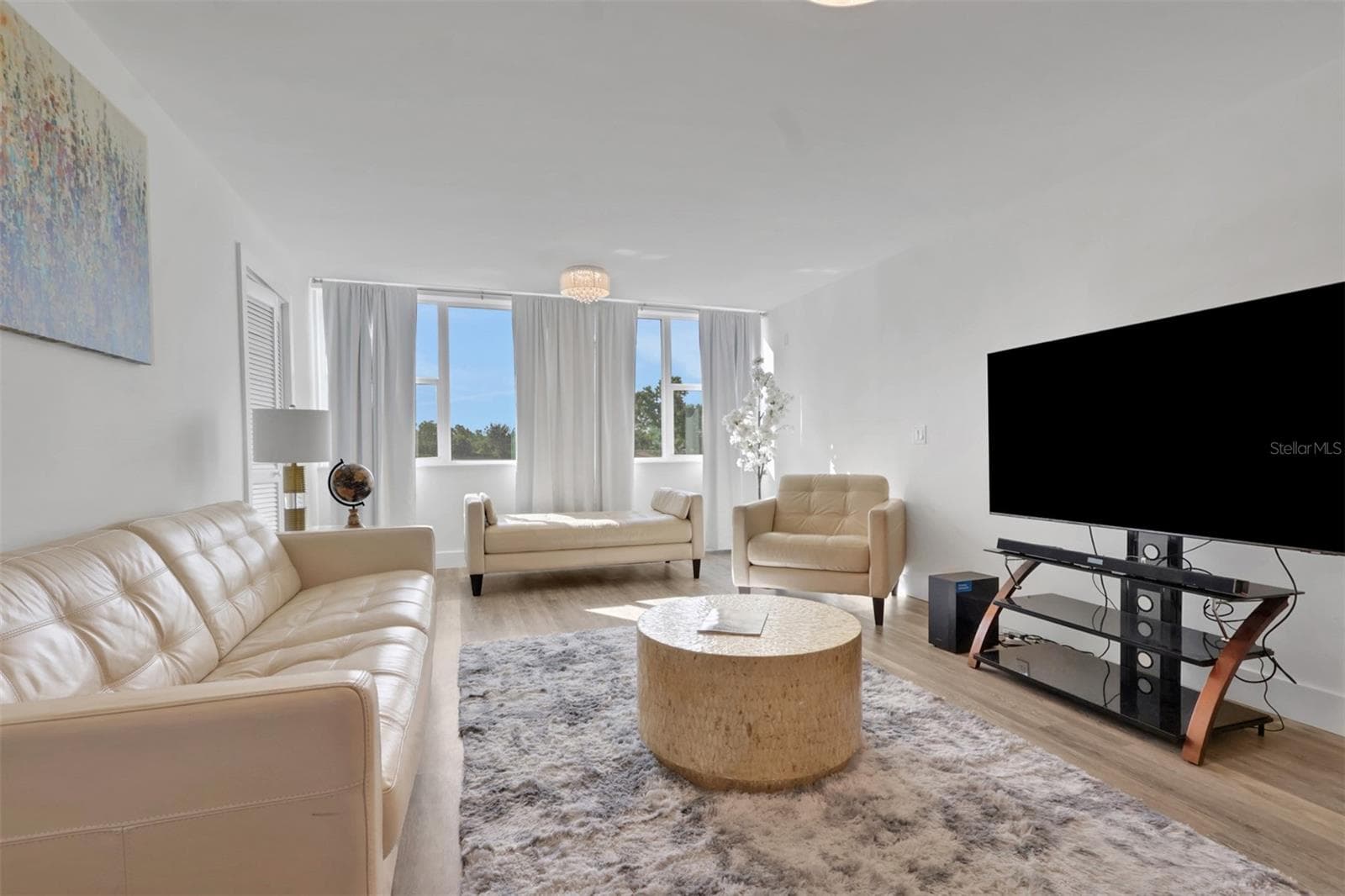 Living Room overlooking golf course - 1740 PINE VALLEY DR #213, FORT MYERS
