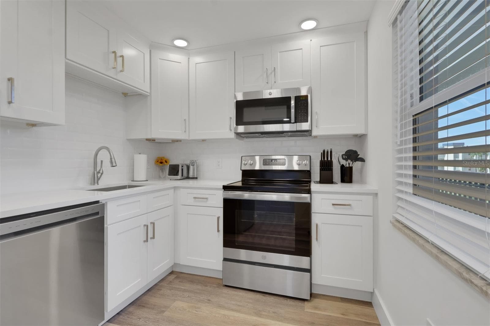 Remodeled kitchen - 1740 PINE VALLEY DR #213, FORT MYERS