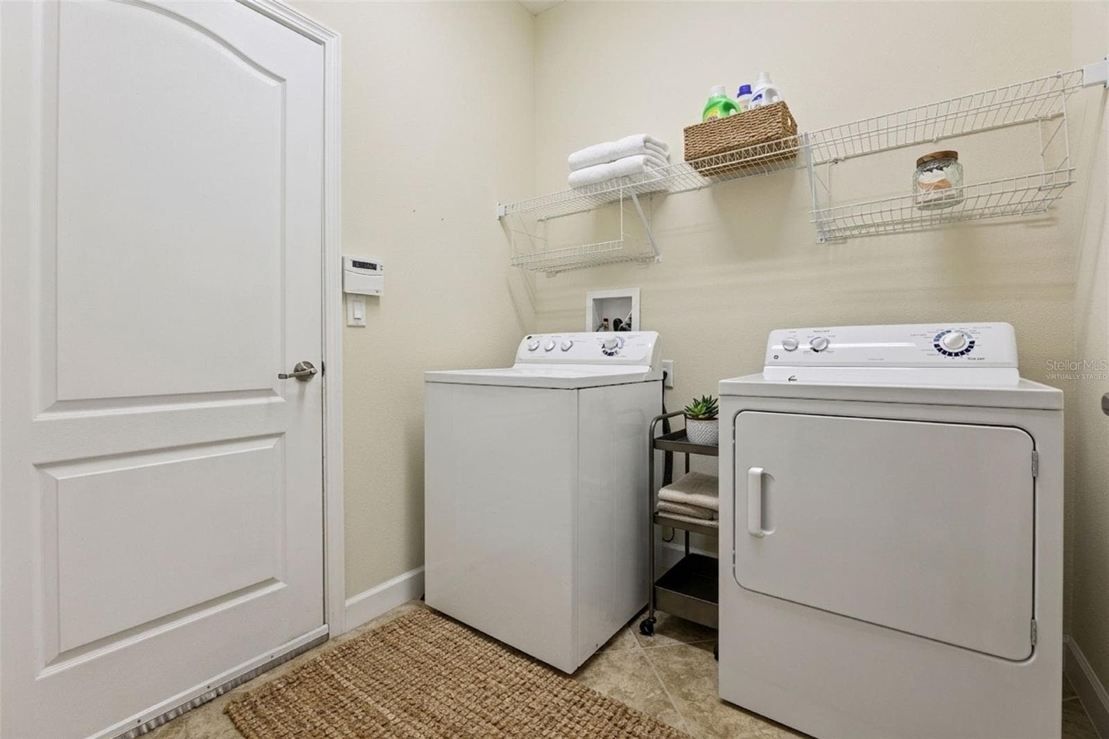 Virtually staged laundry room - 2892 SANDY CAY ST, CLERMONT