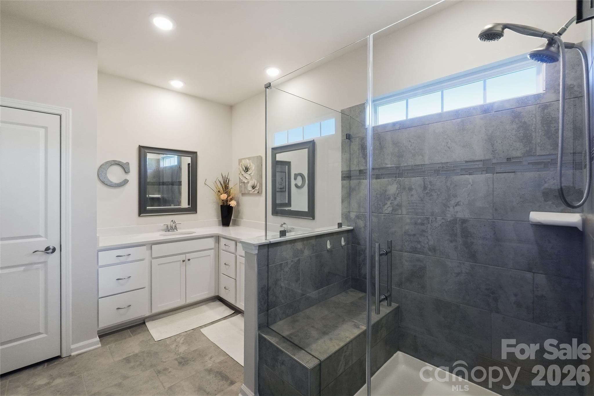 Frameless shower enclosure with bench - 3162 Windhaven Lane, Tega Cay