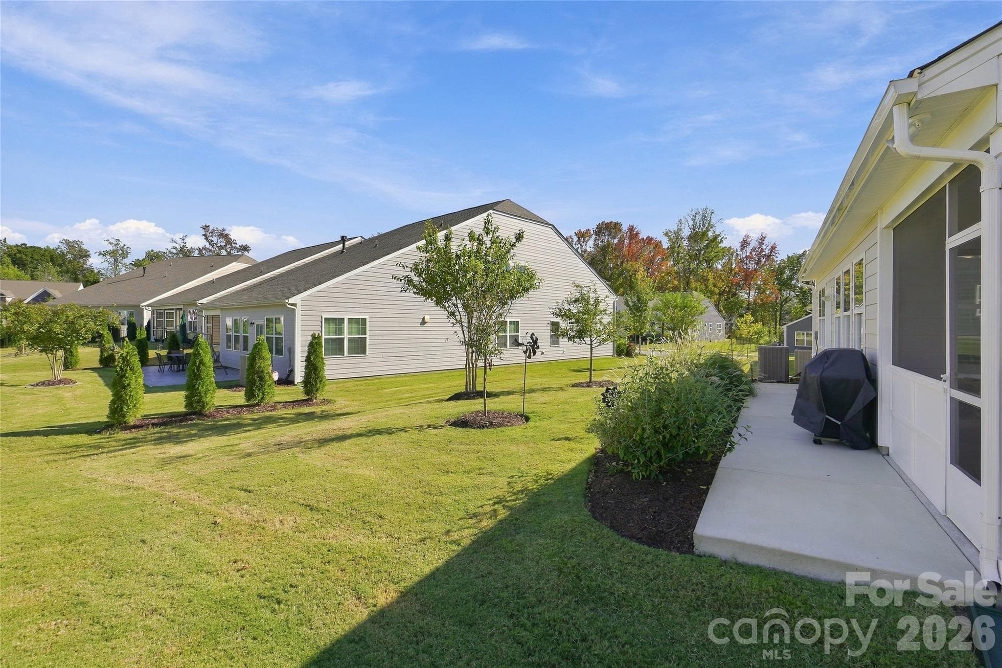 Back concrete patio for outdoor grilling - 3162 Windhaven Lane, Tega Cay