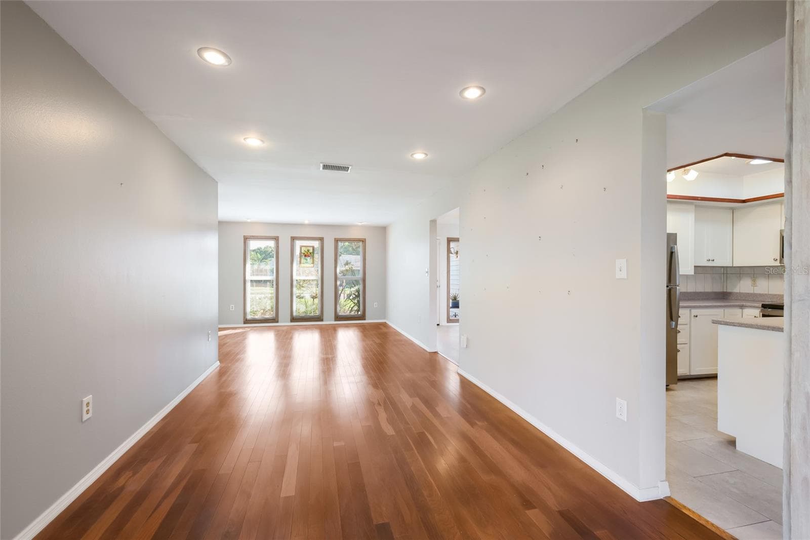 Dining room and living room - 204 46TH ST NW, BRADENTON