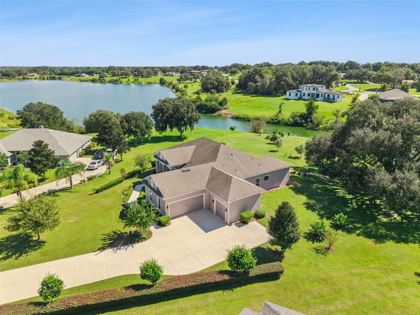 Welcome home to 36819 Wolf Ct. located on over 1.6 acres with water frontage - 36819 WOLF CT, EUSTIS