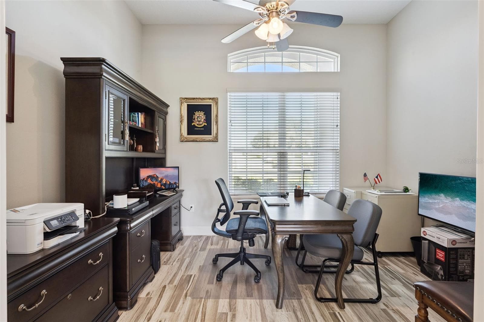 This home features a dedicated office space, providing the perfect environment for remote work and private professional meetings. - 36819 WOLF CT, EUSTIS