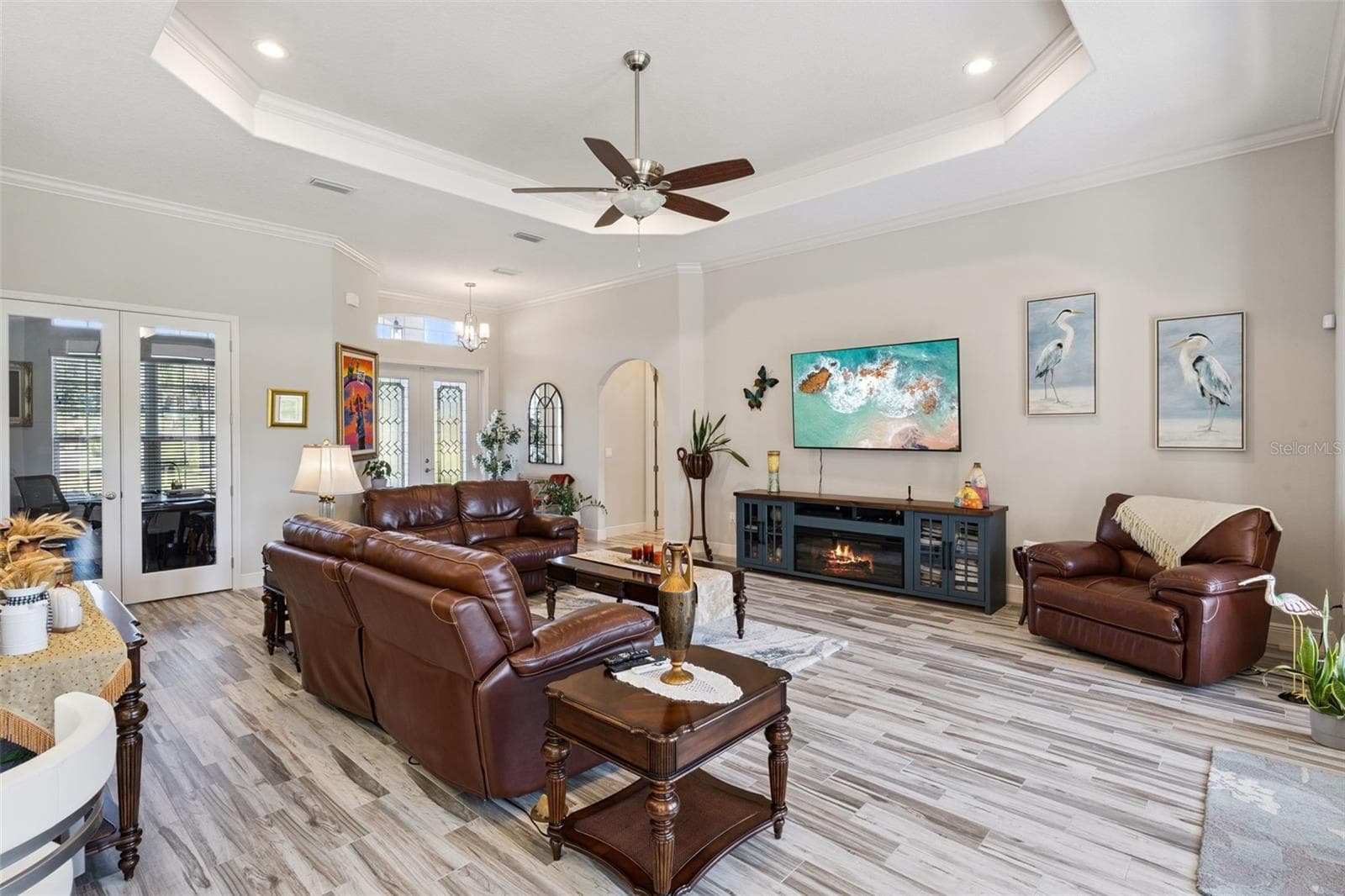 Trey ceiling in family room with view of french doors that lead to private office - 36819 WOLF CT, EUSTIS