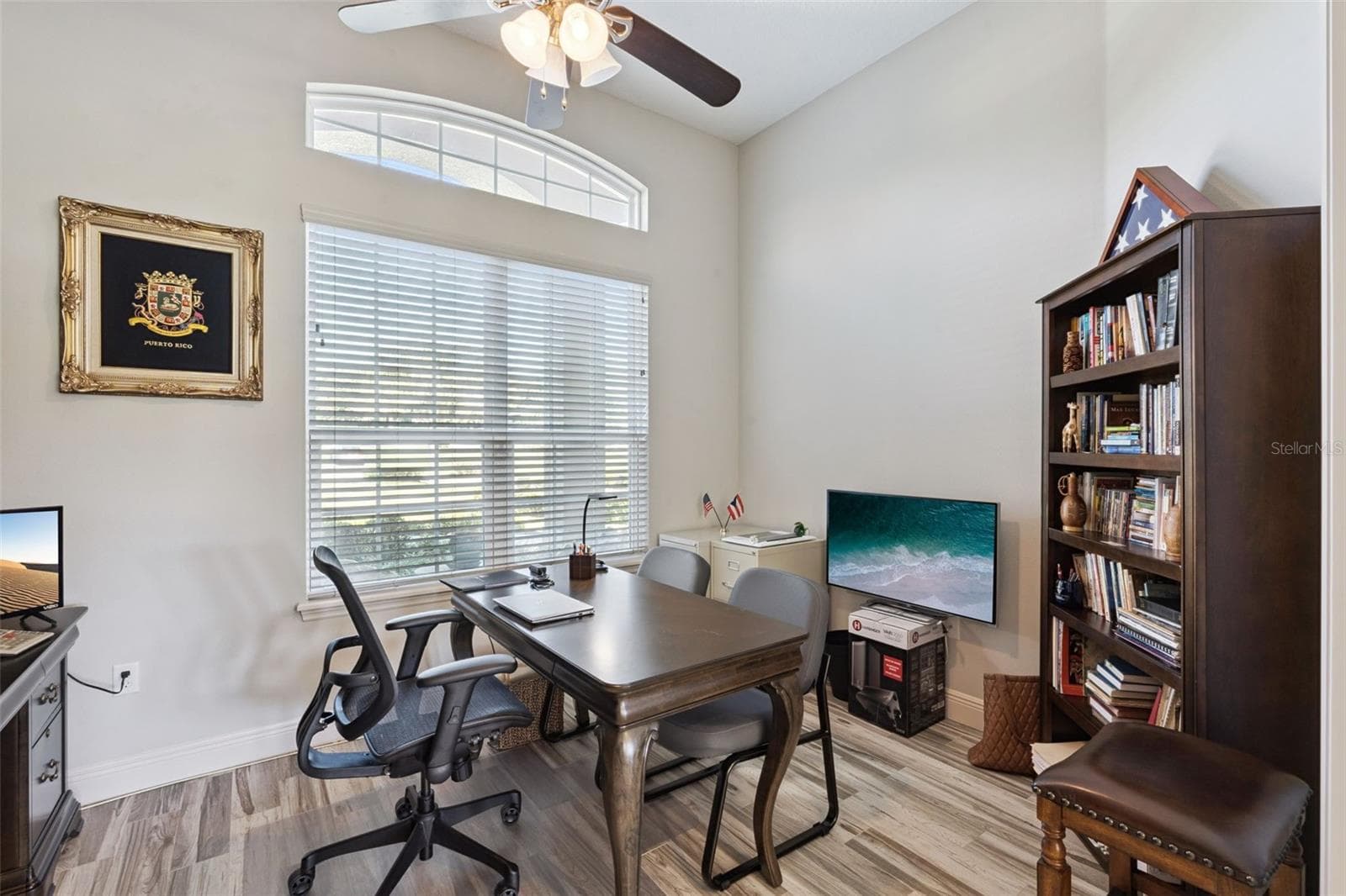 Office located near front door for easy access and wood look tile floors - 36819 WOLF CT, EUSTIS