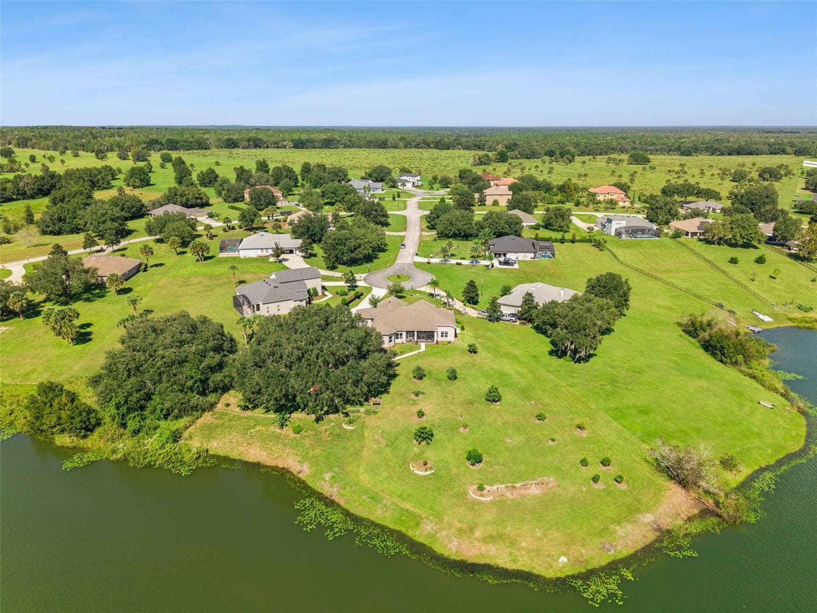 Located at the end of the cul de sac with direct water front location - 36819 WOLF CT, EUSTIS