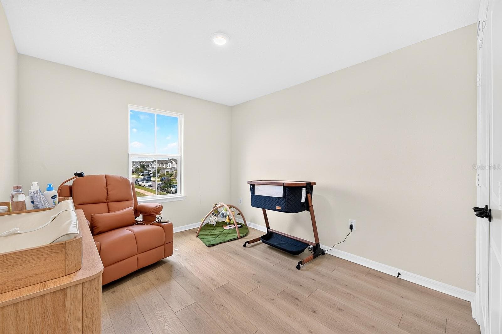 Bedroom 2 is perfectly sized to serve as a guest room, home office or hobby space. - 1785 PETIOLE PL, KISSIMMEE