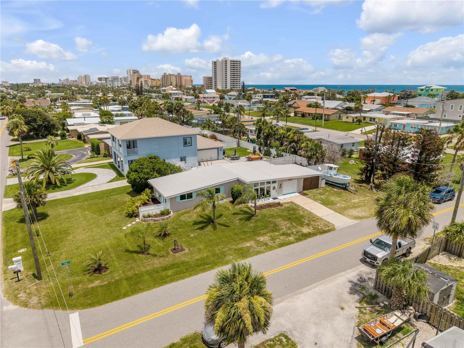 Elevated view of the home and its corner-lot setting. - 3929 S PENINSULA DR, PORT ORANGE