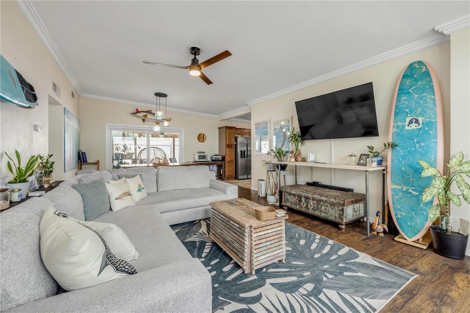 Alternate living-room view showing the seating area and room layout. - 3929 S PENINSULA DR, PORT ORANGE