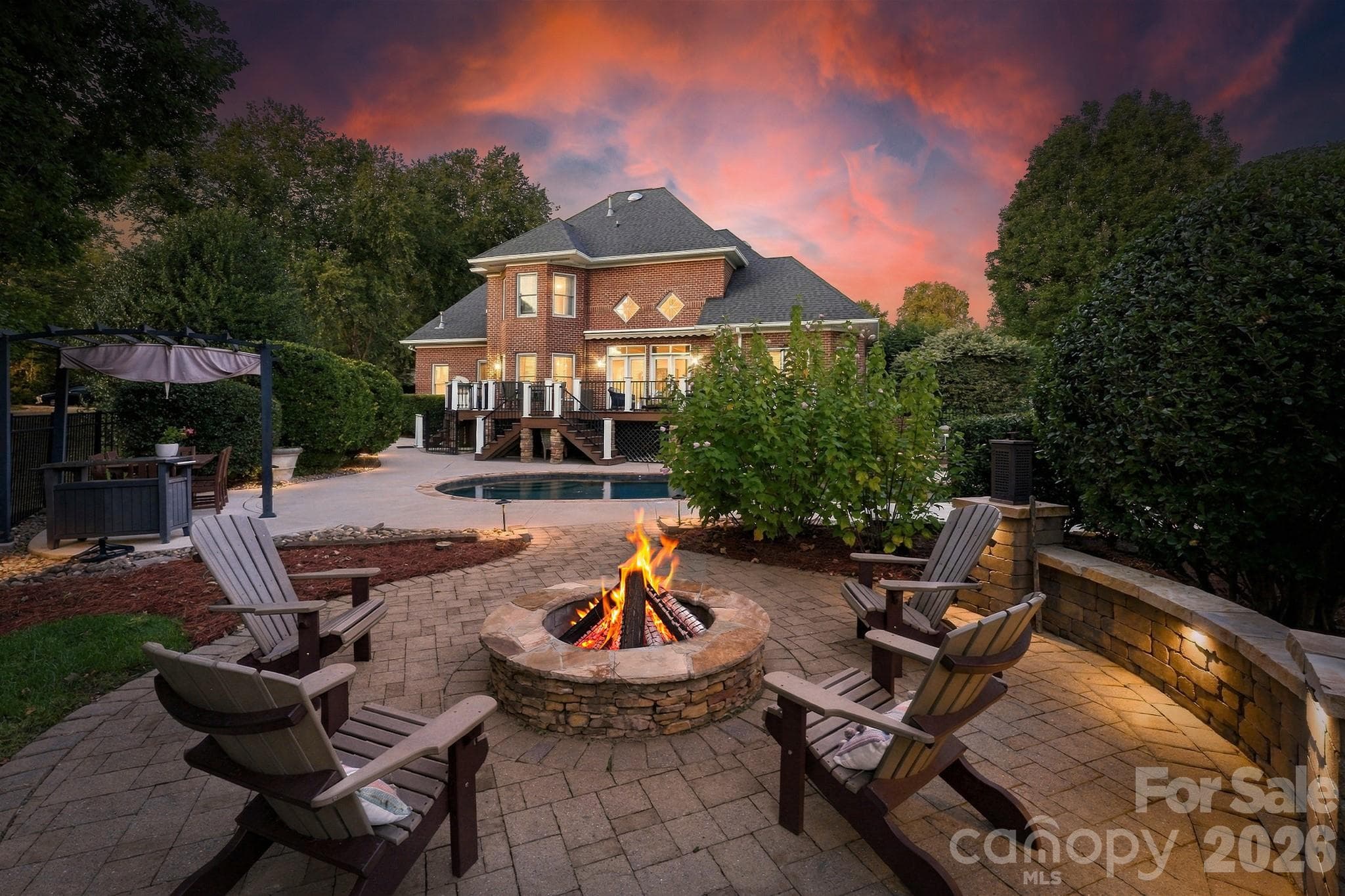 Twilight Photo of Fire Pit and Back of Home - 105 Kings Crest Drive, Mooresville