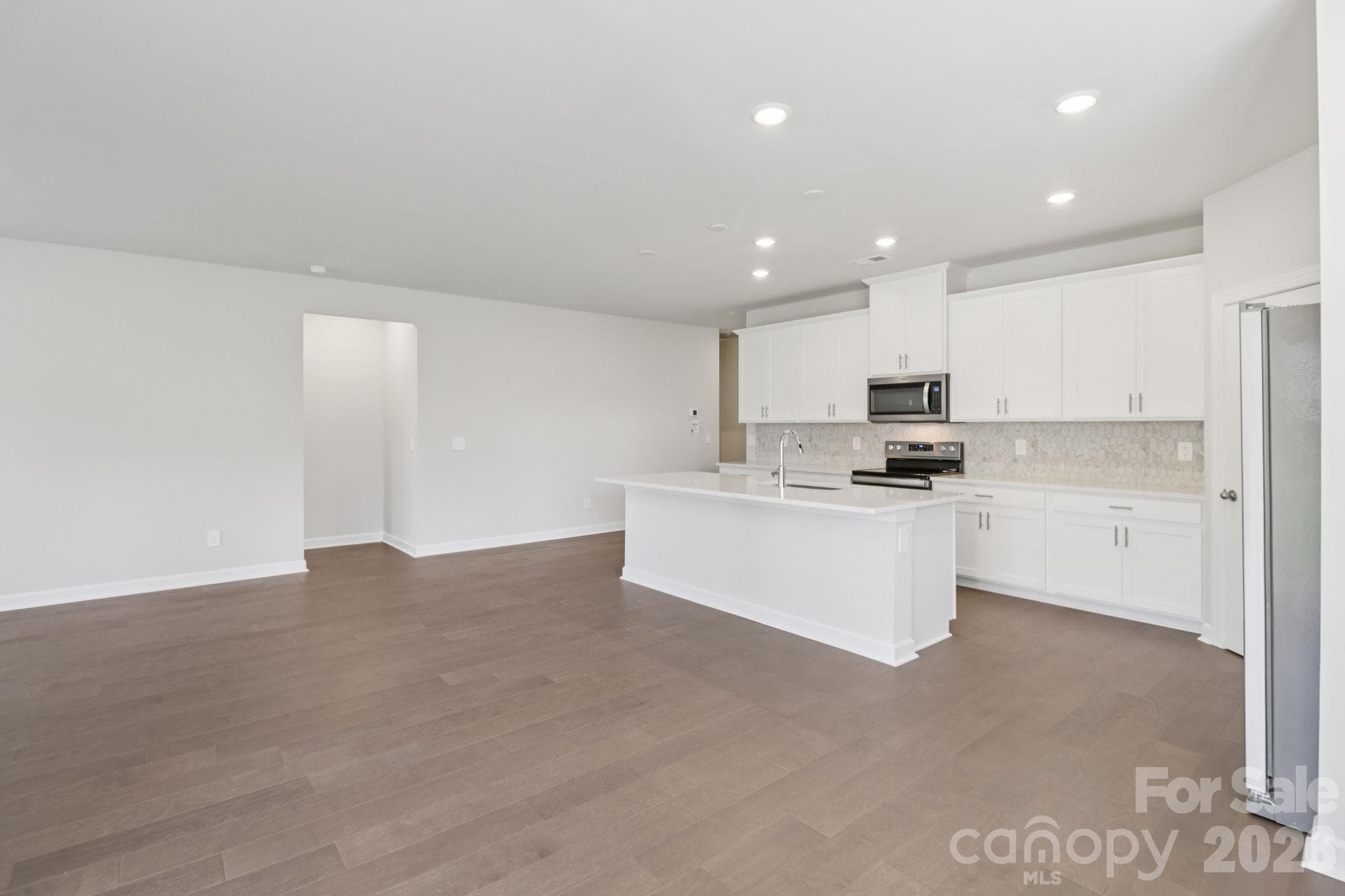 Photo is not of the actual home, but is an inspirational photo of builder’s model home and may depict options, furnishings, and/or decorator features that are not included - 2302 Snapdragon Court, Stanley