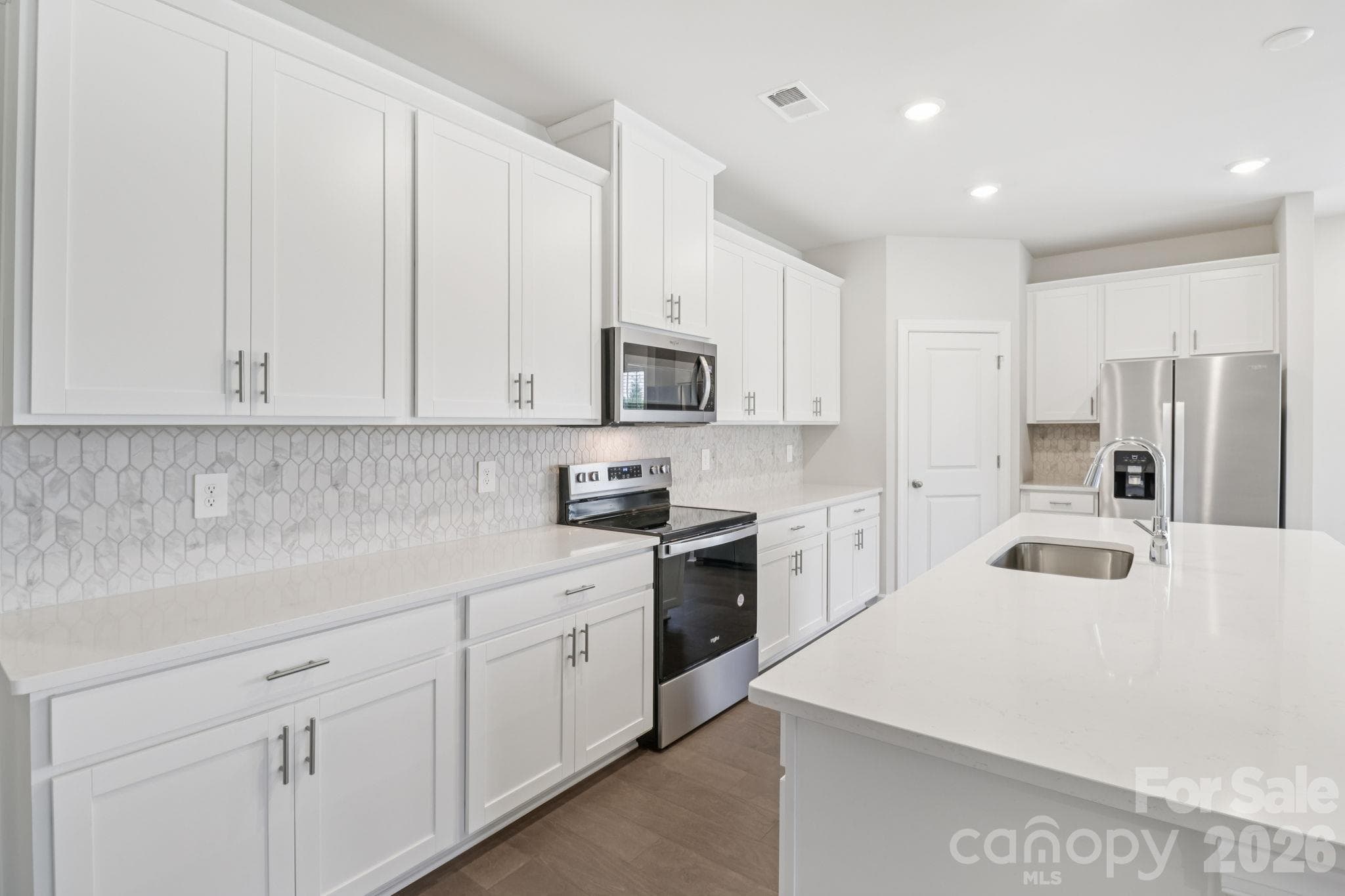 Photo is not of the actual home, but is an inspirational photo of builder’s model home and may depict options, furnishings, and/or decorator features that are not included - 2302 Snapdragon Court, Stanley