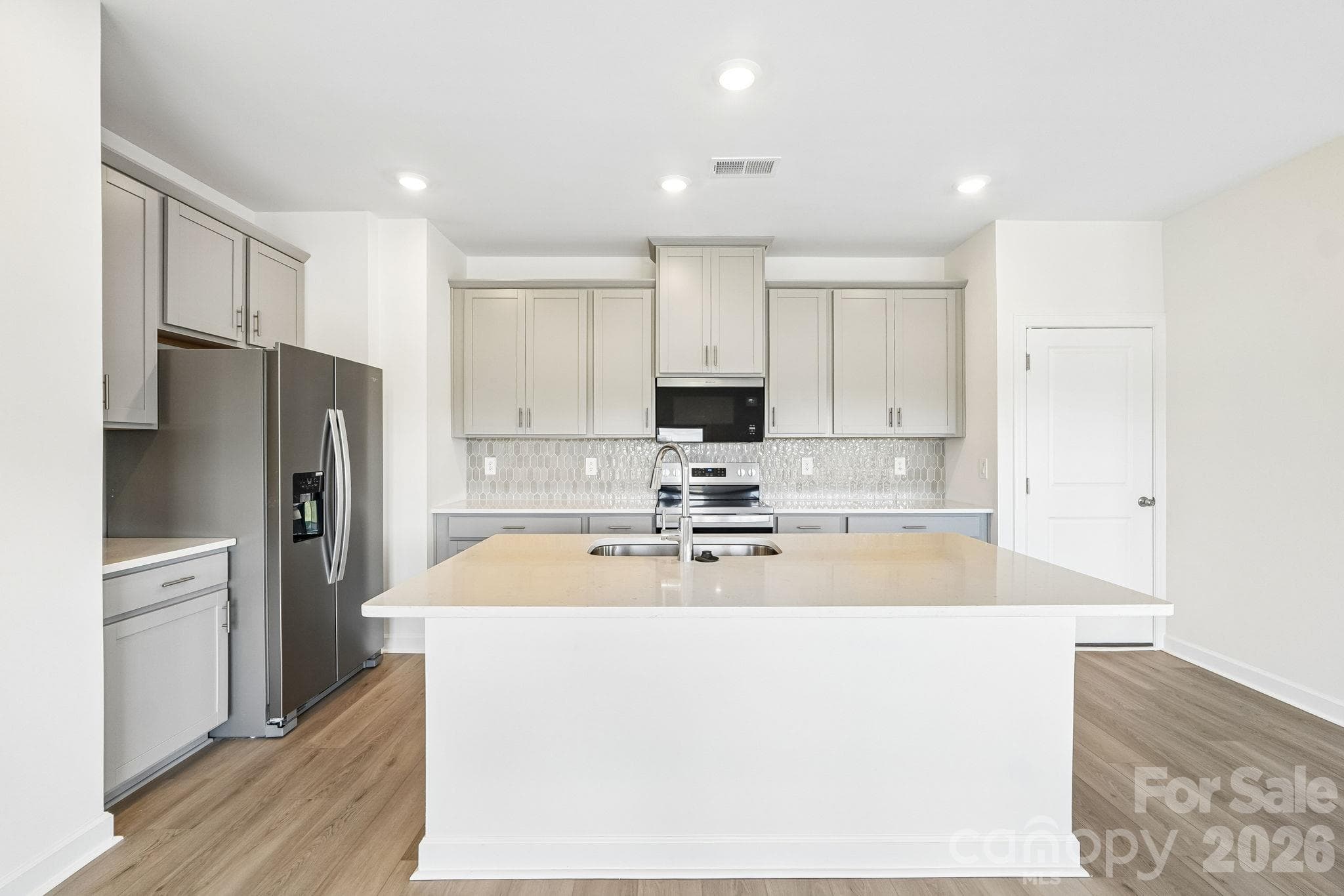 Photo is not of the actual home, but is an inspirational photo of builder’s model home and may depict options, furnishings, and/or decorator features that are not included - 12548 Russellwood Lane, Charlotte