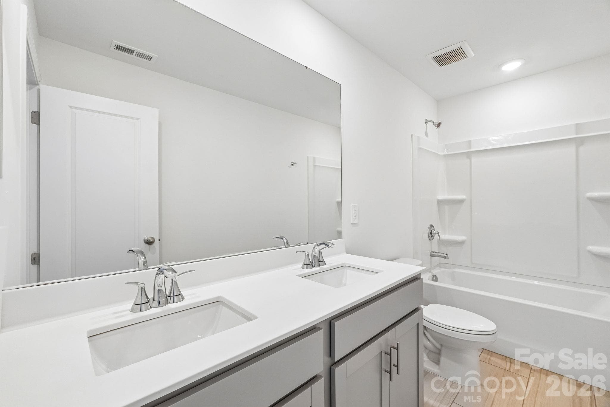 Photo is not of the actual home, but is an inspirational photo of builder’s model home and may depict options, furnishings, and/or decorator features that are not included - 12548 Russellwood Lane, Charlotte