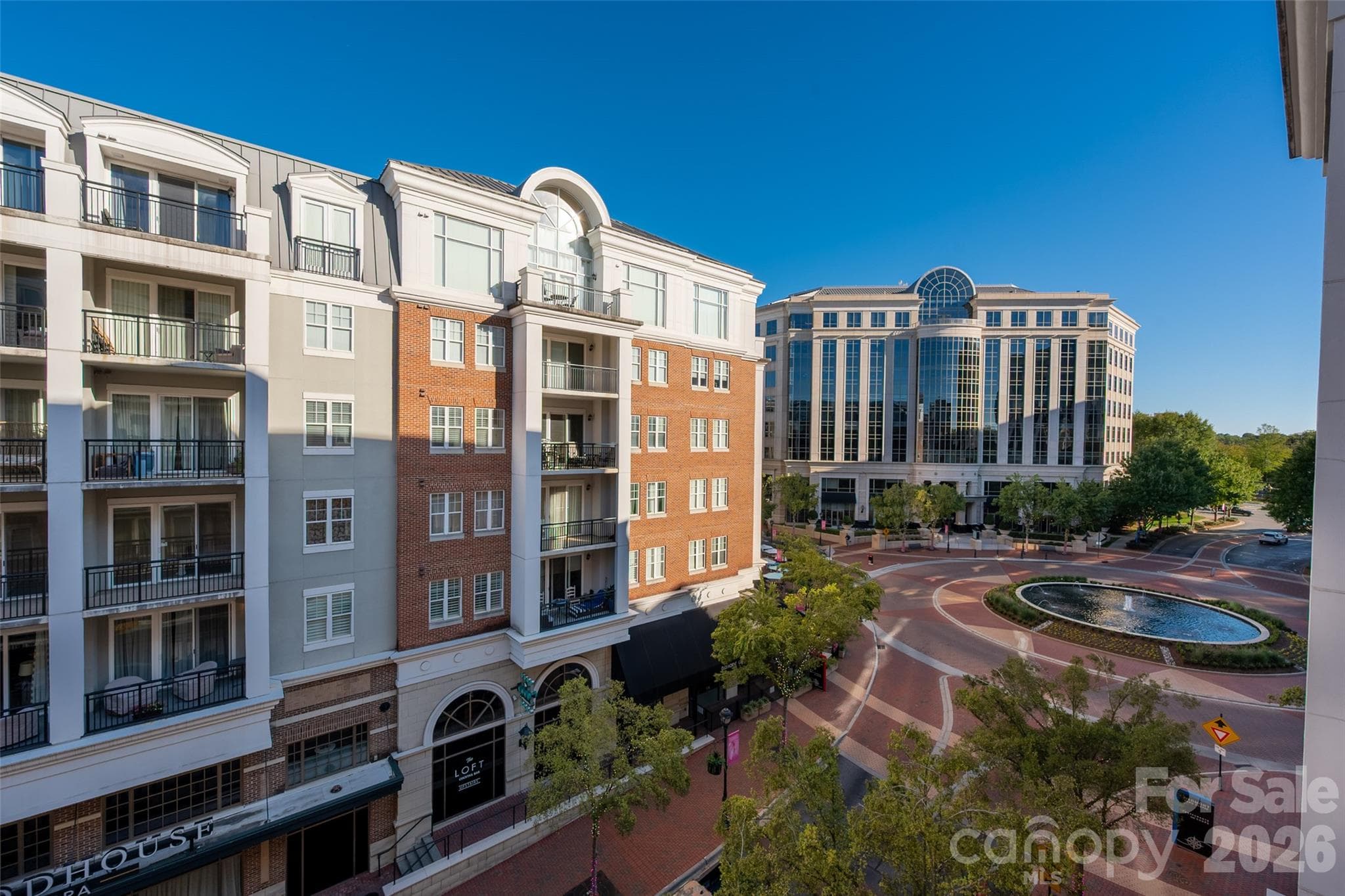 View of the Fountain from Double Balcony - 4620 Piedmont Row Drive, Charlotte