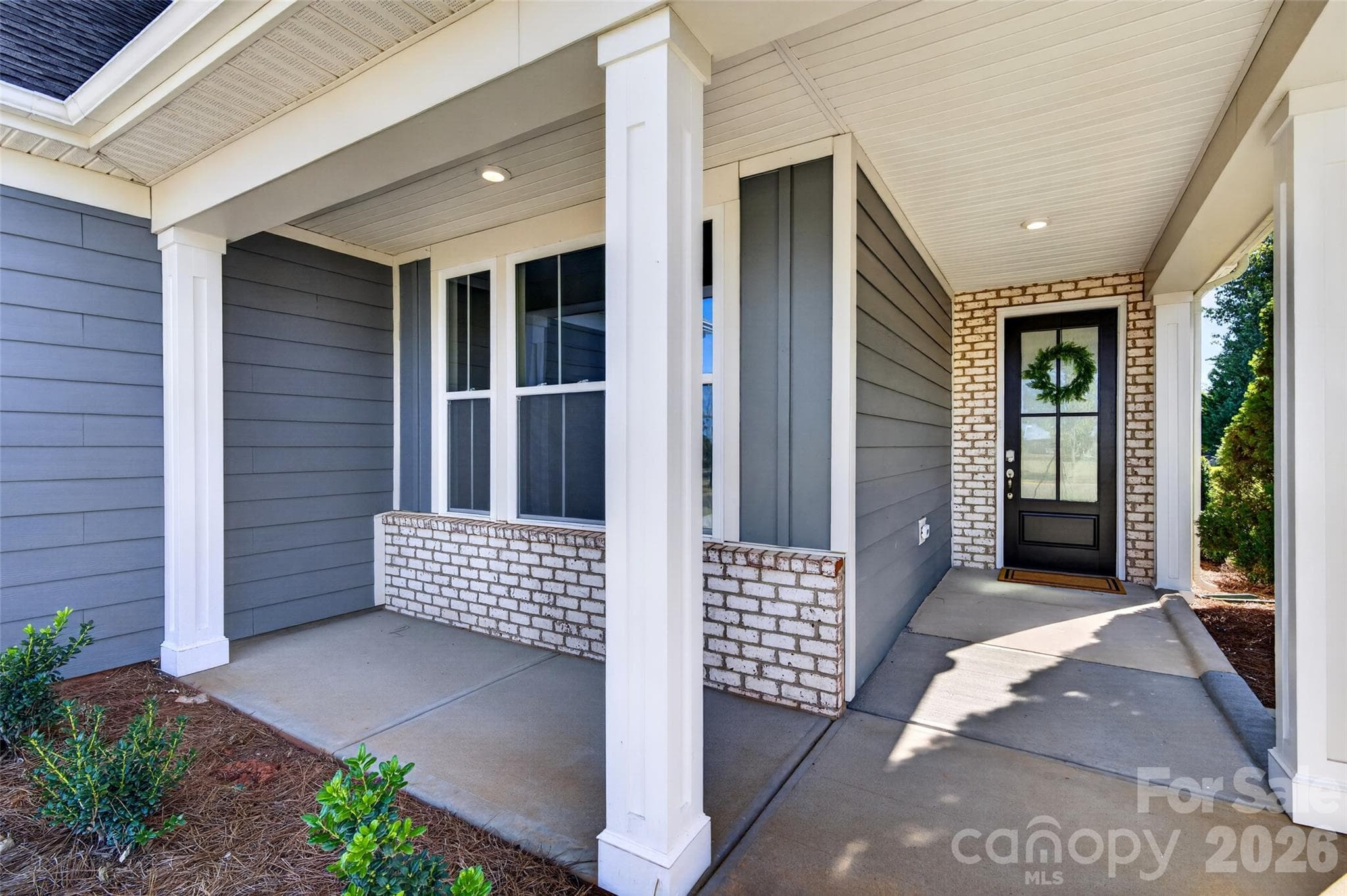 Large covered front porch - 8905 Silver Springs Court, Charlotte