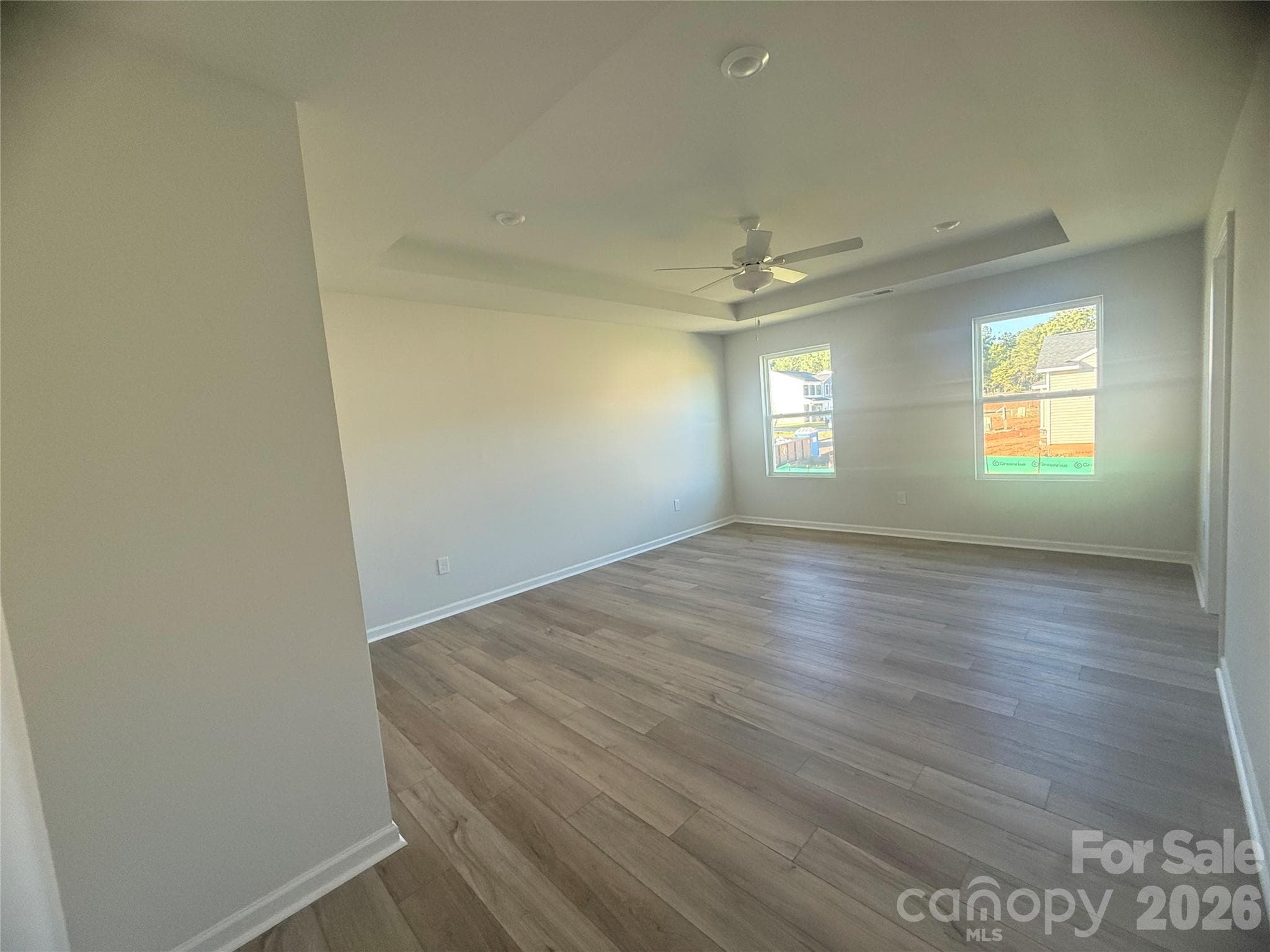 Primary bedroom with boxed ceiling - 1227 Bansal Drive, Charlotte