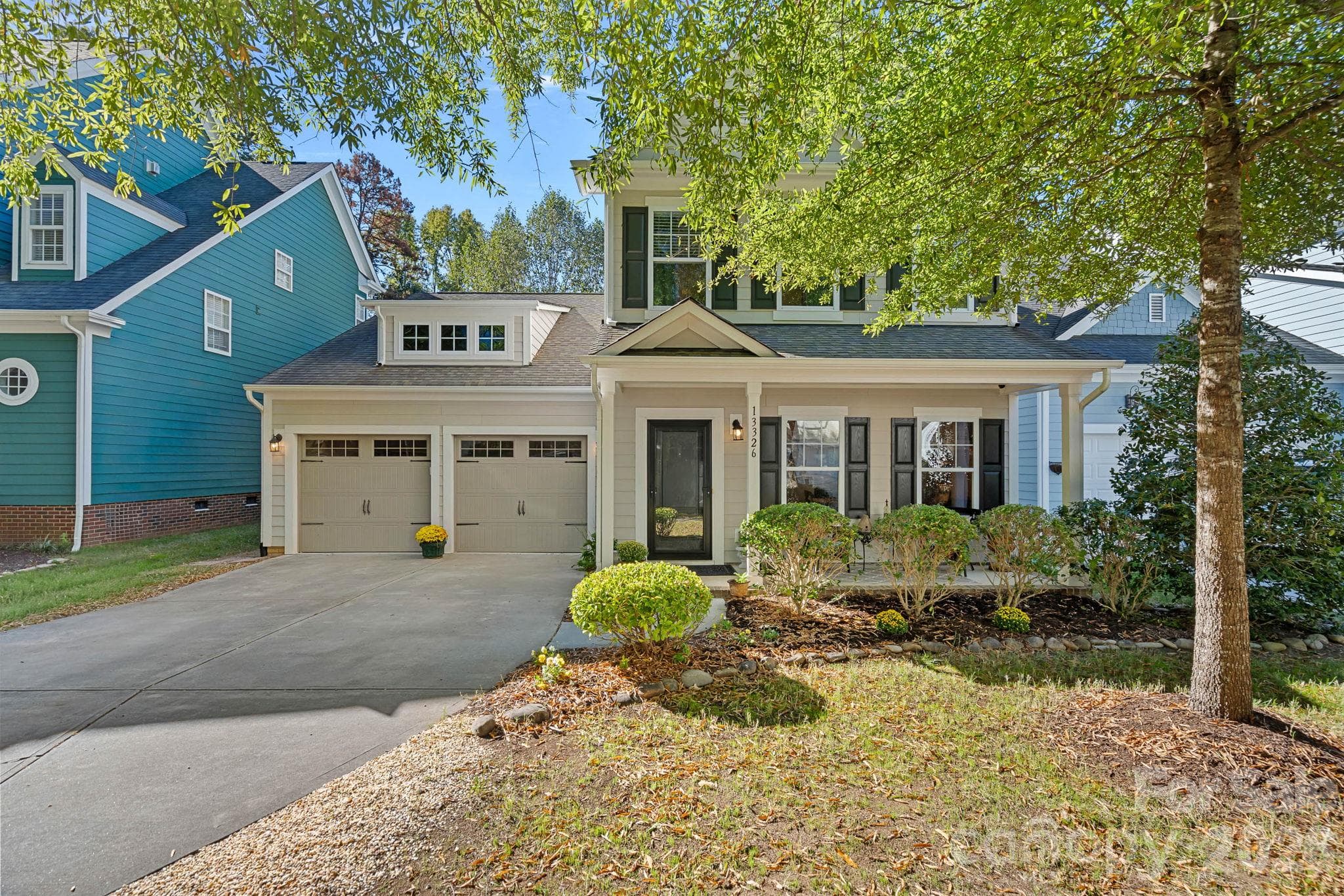 Beautiful 4 bedroom home with covered front porch and private, fenced backyard. - 13326 Pierre Reverdy Drive, Davidson