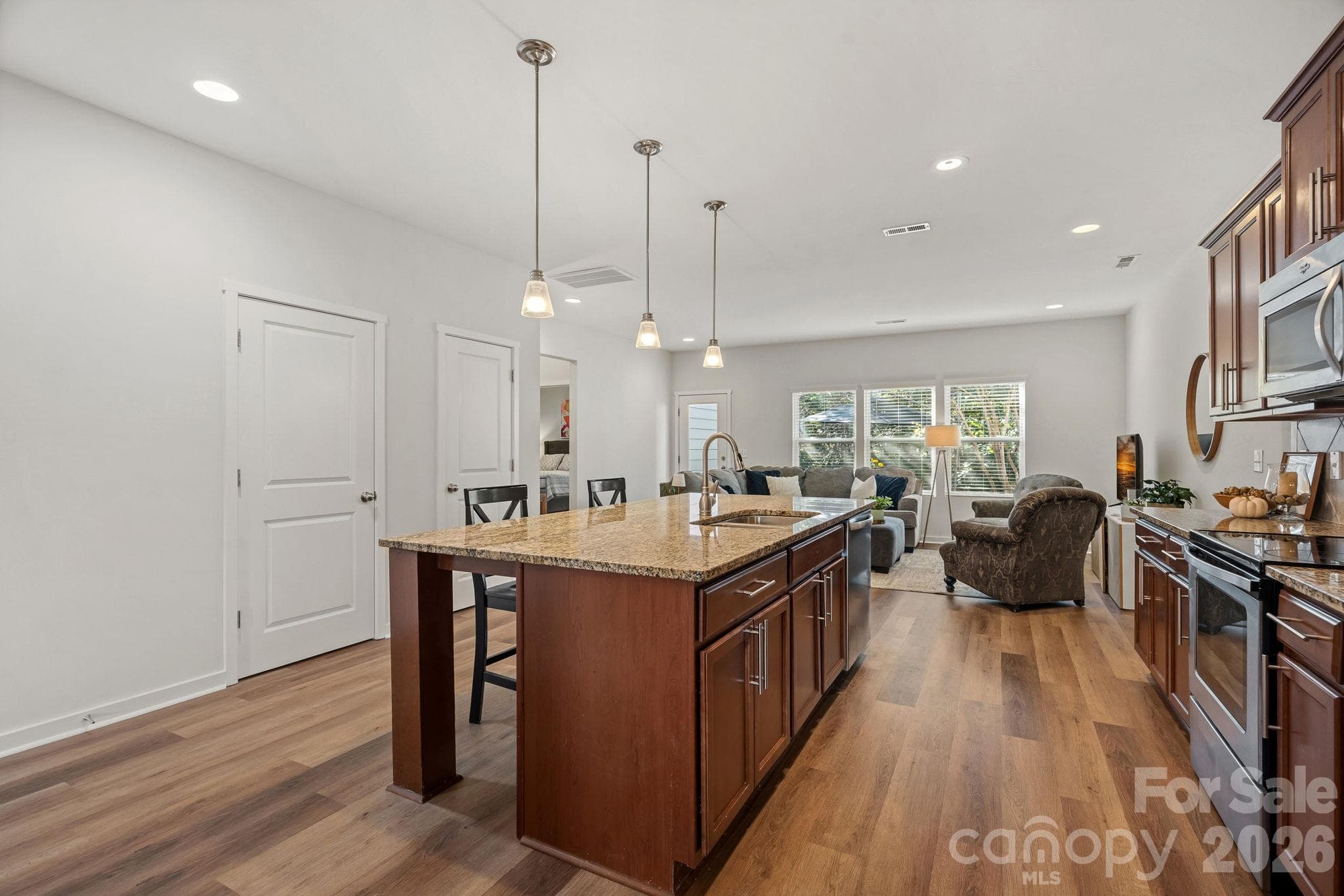 Spacious Kitchen Island with pendant lighting and recessed lighting - 13326 Pierre Reverdy Drive, Davidson