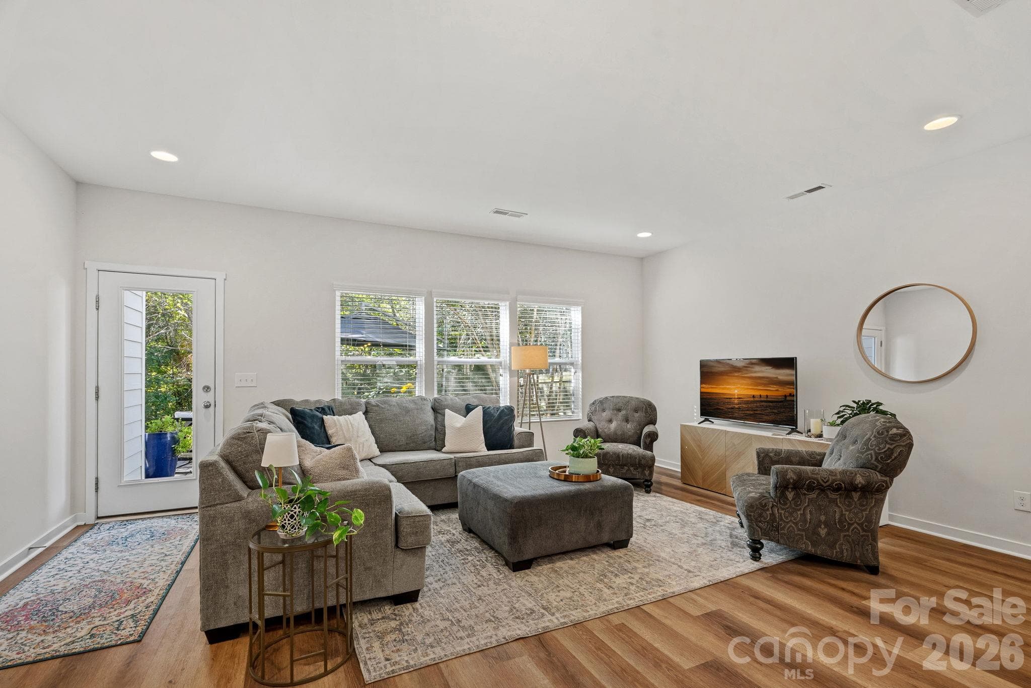 Back door leads to patio and backyard - 13326 Pierre Reverdy Drive, Davidson