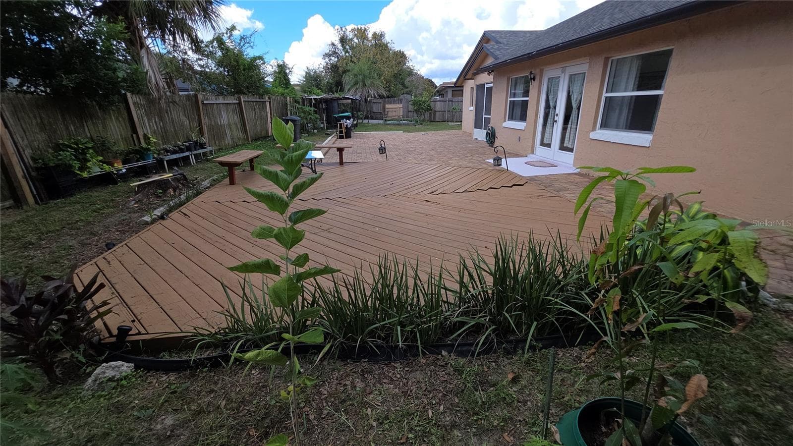 Backyard with Deck - 7514 HERRICKS LOOP, ORLANDO
