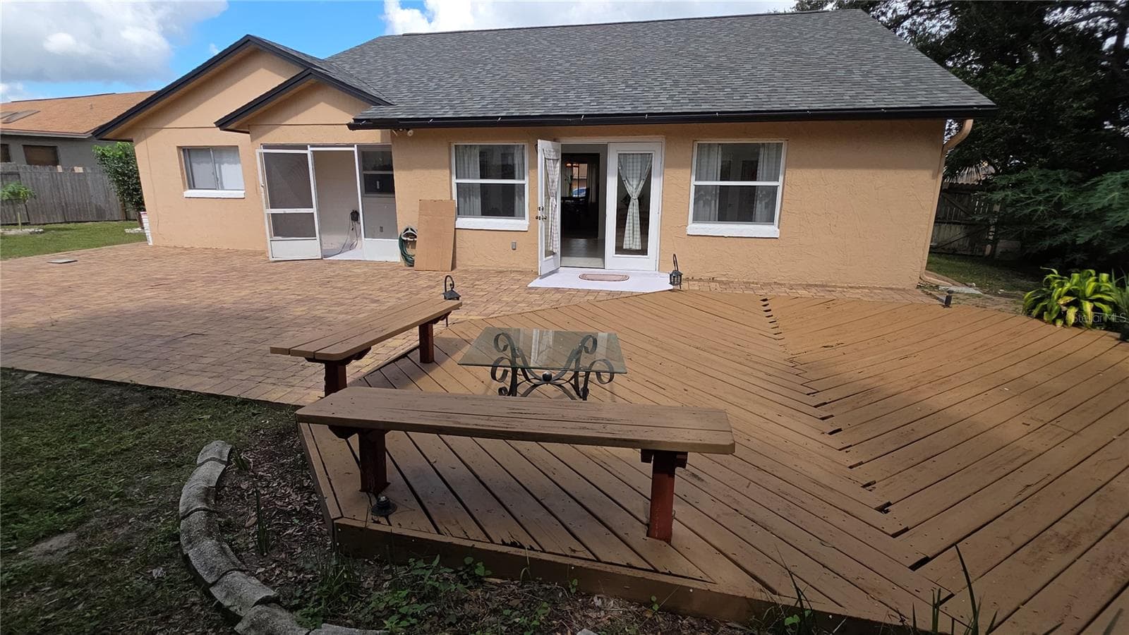 Back Yard wtih wood deck - 7514 HERRICKS LOOP, ORLANDO