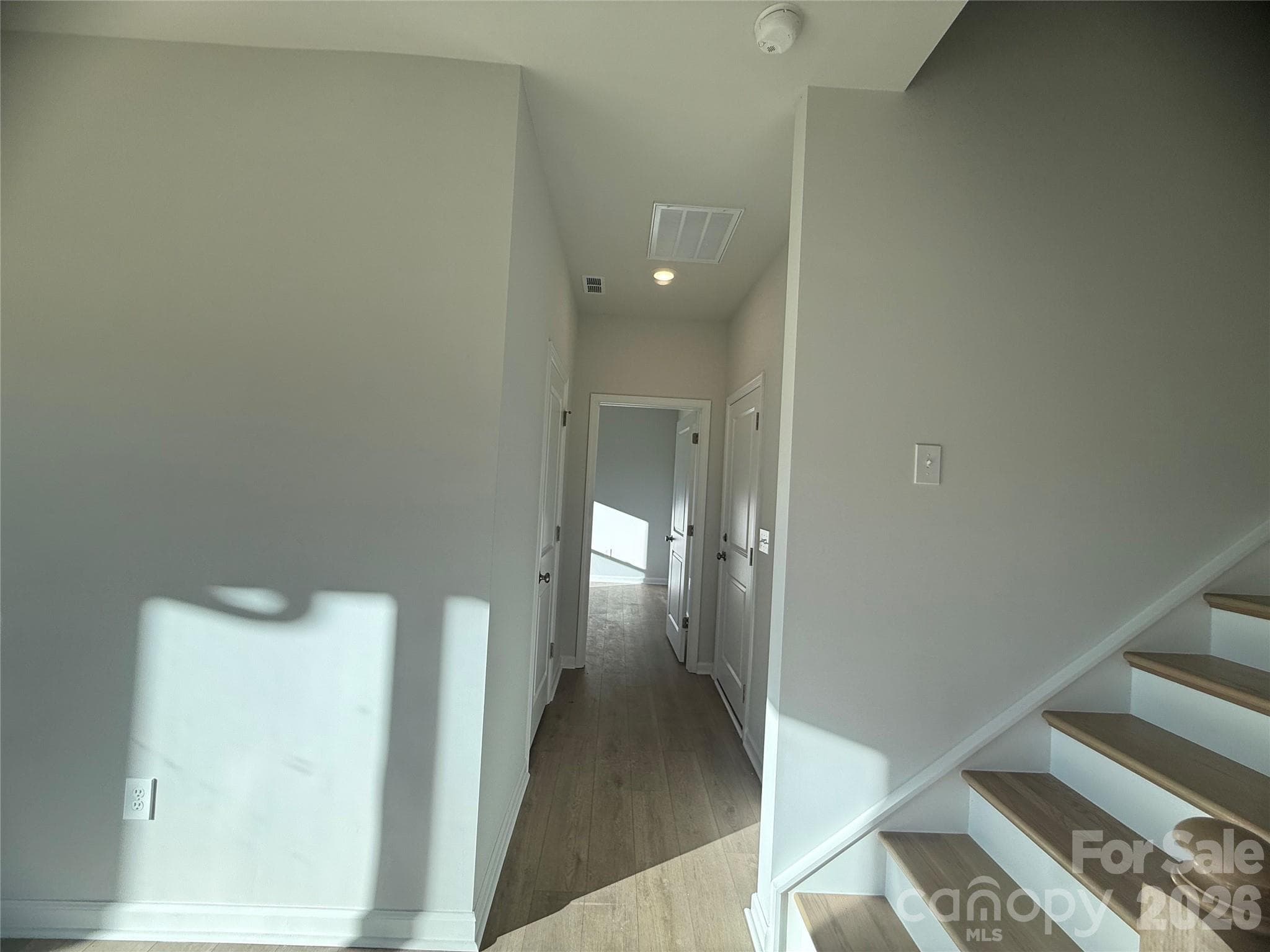 Hallway to private guest room on 1st floor - 4021 Juno Drive, Charlotte