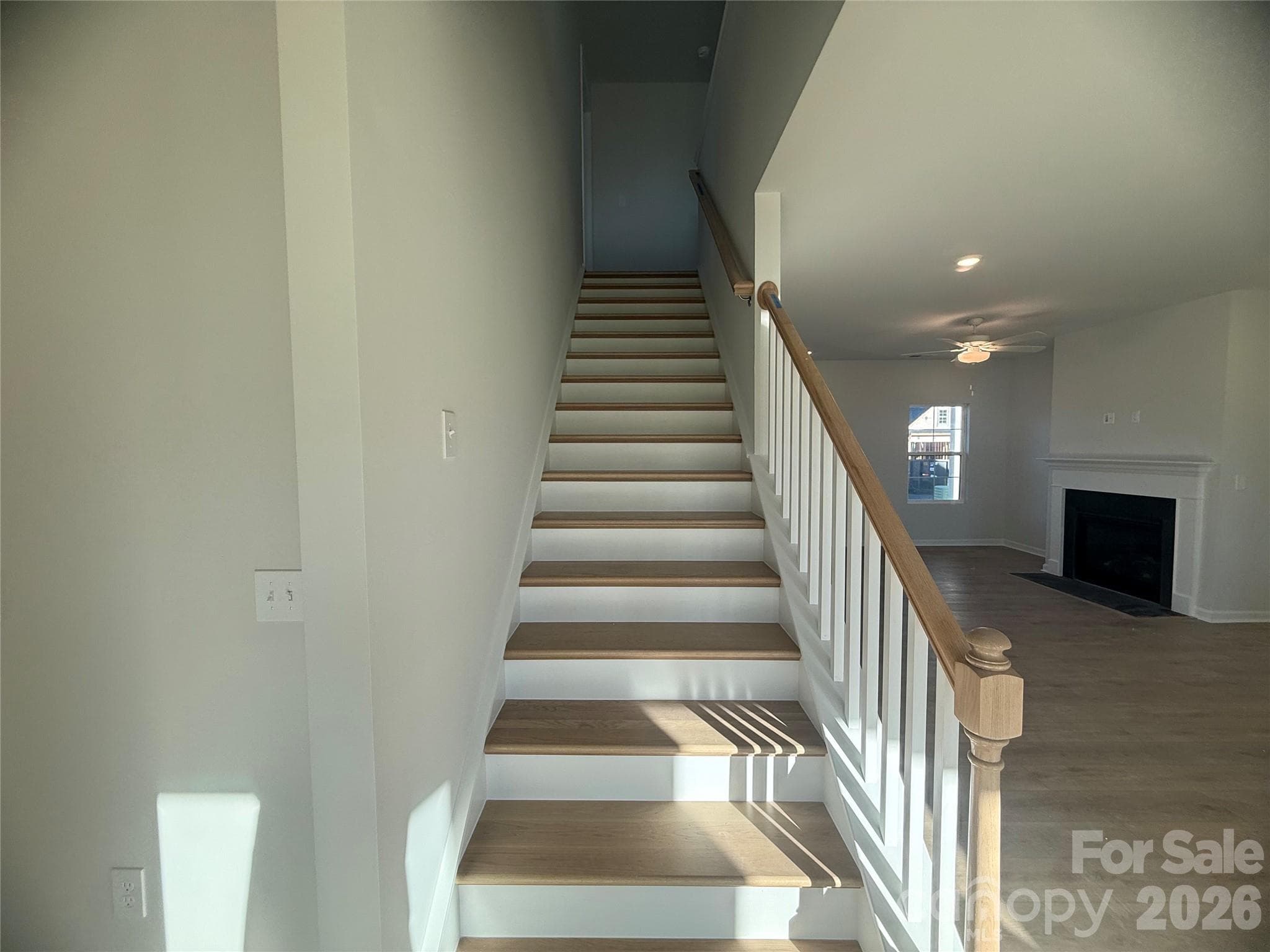 Oak thread stairs leading to 2nd floor - 4021 Juno Drive, Charlotte