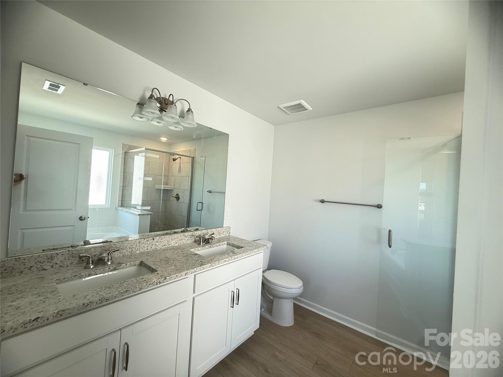 Primary full bath with double sinks - 4021 Juno Drive, Charlotte