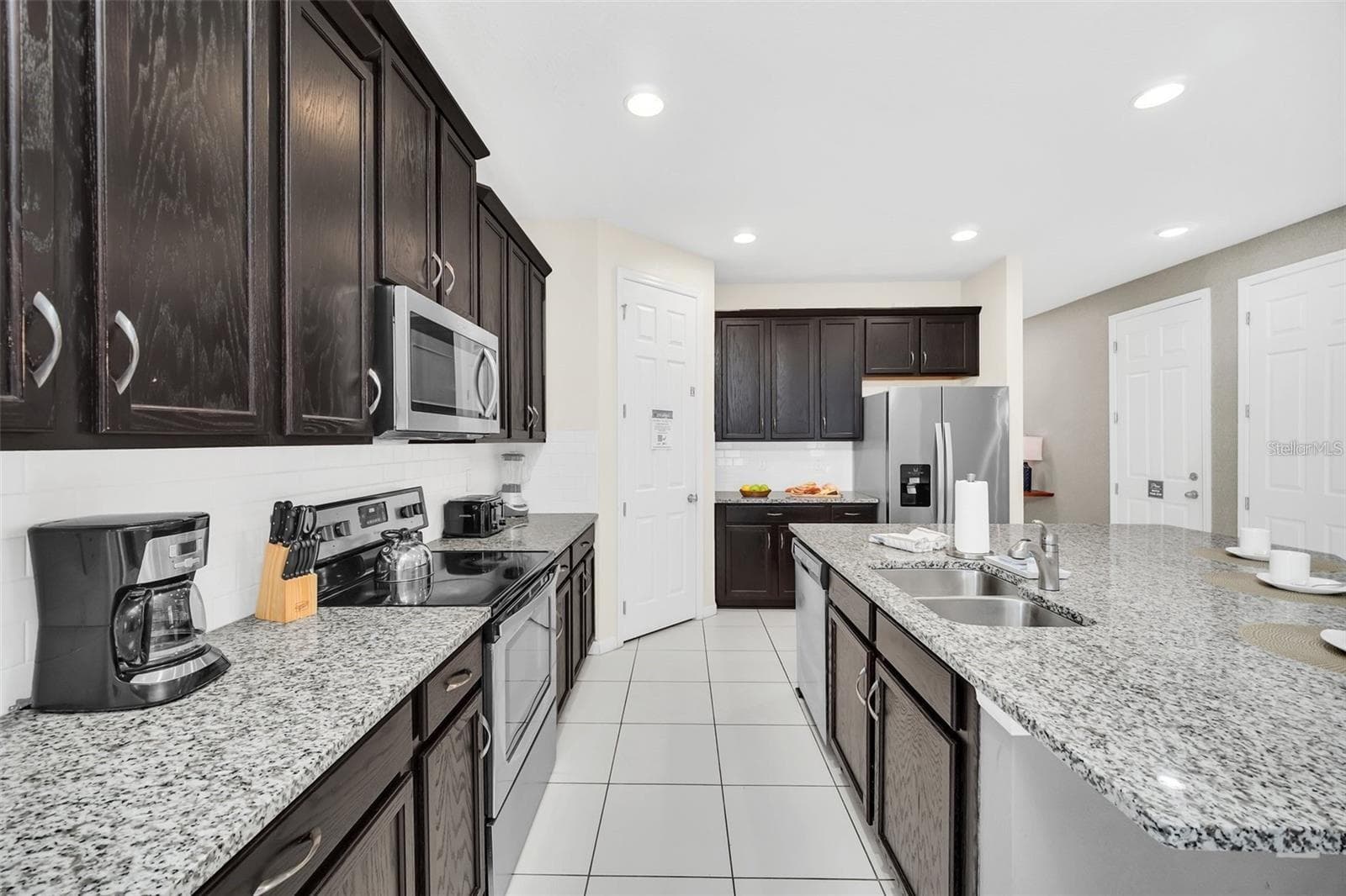 Single Family Residence at 9009 EGRET MILLS TER, KISSIMMEE, photo 9 of 60