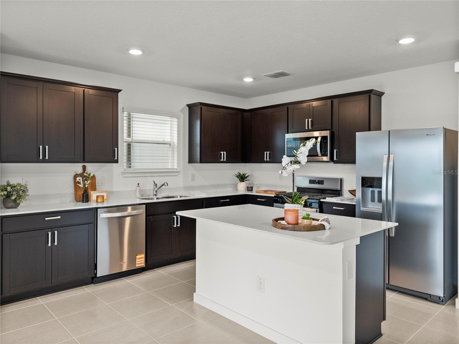 Kitchen with all New Stainless Steel Appliances, Quartz Countertops & New Hardware - 1076 KISTNA DR, ZEPHYRHILLS