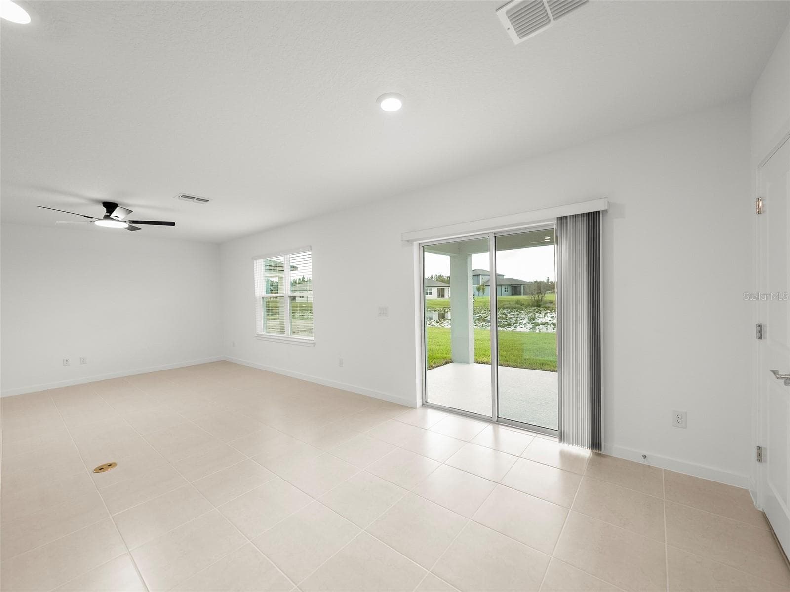 Amazing Views to Covered Lanai and Pond View Fully Fenced Backyard - 1076 KISTNA DR, ZEPHYRHILLS