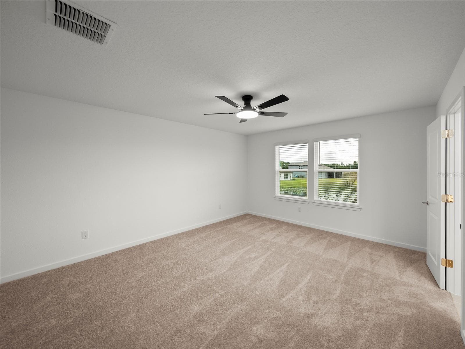 Alternate View of Primary Suite - 1076 KISTNA DR, ZEPHYRHILLS