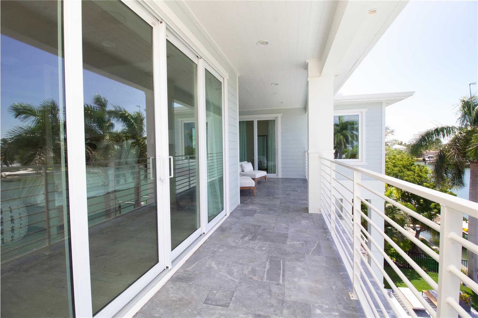 Outdoor Sitting Area Off of Primary, Second & Third Bedrooms - 271 S JULIA CIR, ST PETE BEACH