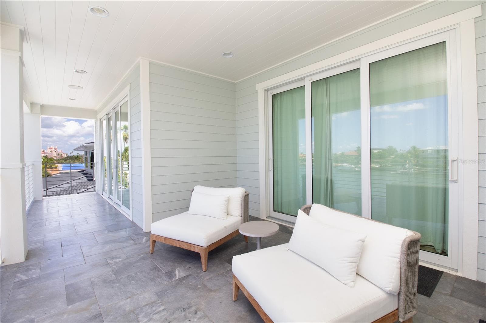 Outdoor Sitting Area Off of Primary, Second & Third Bedrooms - 271 S JULIA CIR, ST PETE BEACH