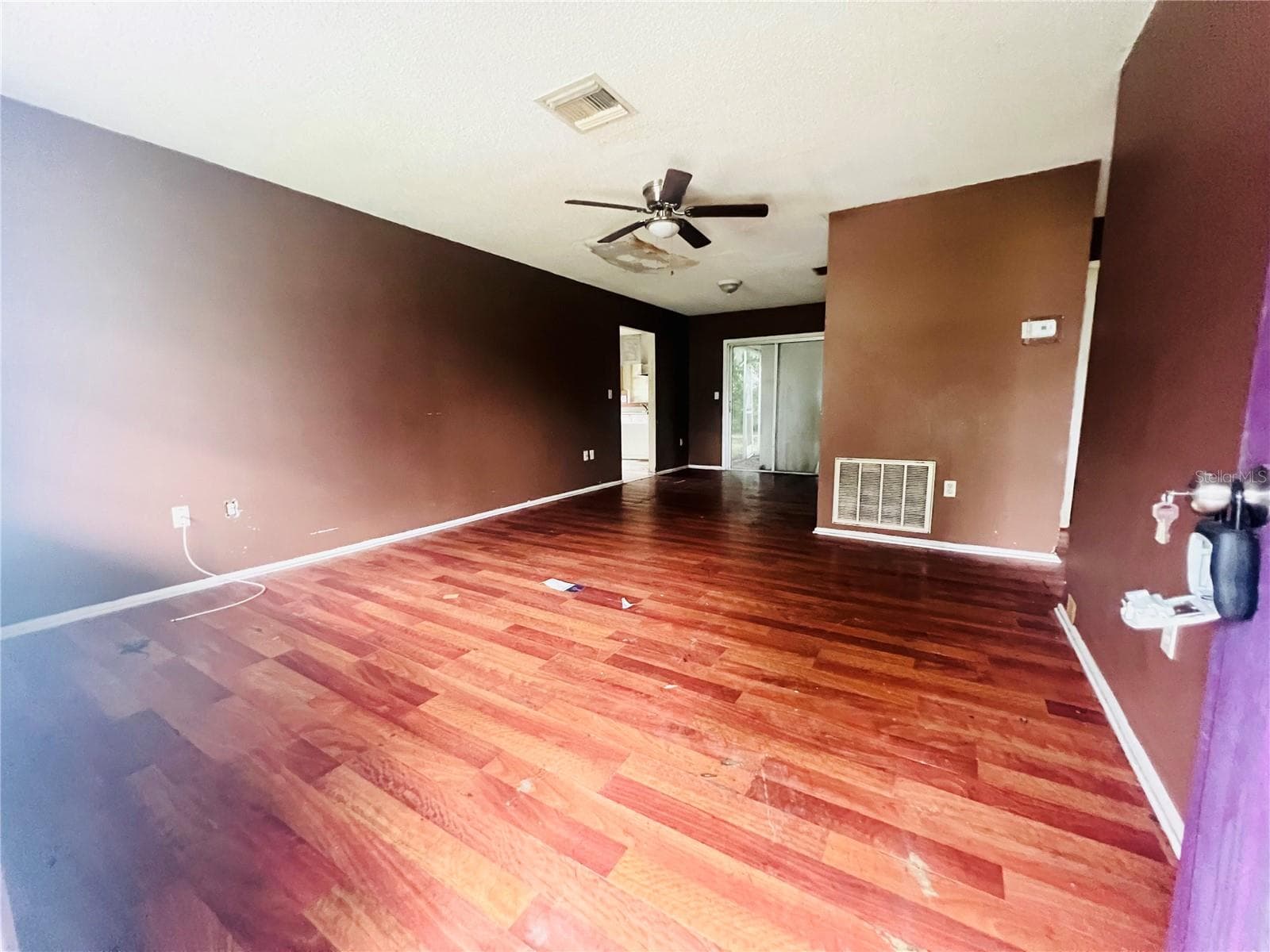 LIVING AND DINING AREA VIEW FROM FRONT DOOR - 3131 CHALON ST, NEW PORT RICHEY