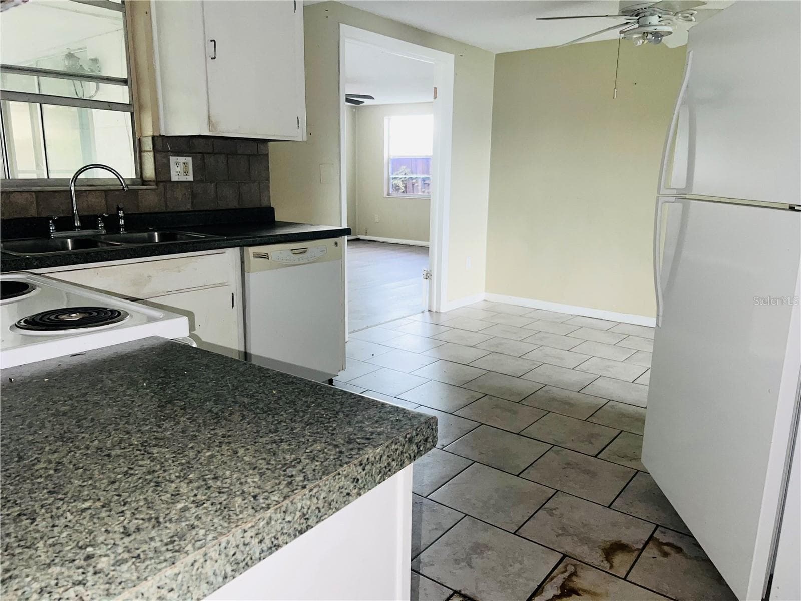 KITCHEN VIEW FROM ALL WAY - 7230 INGLESIDE DR, PORT RICHEY