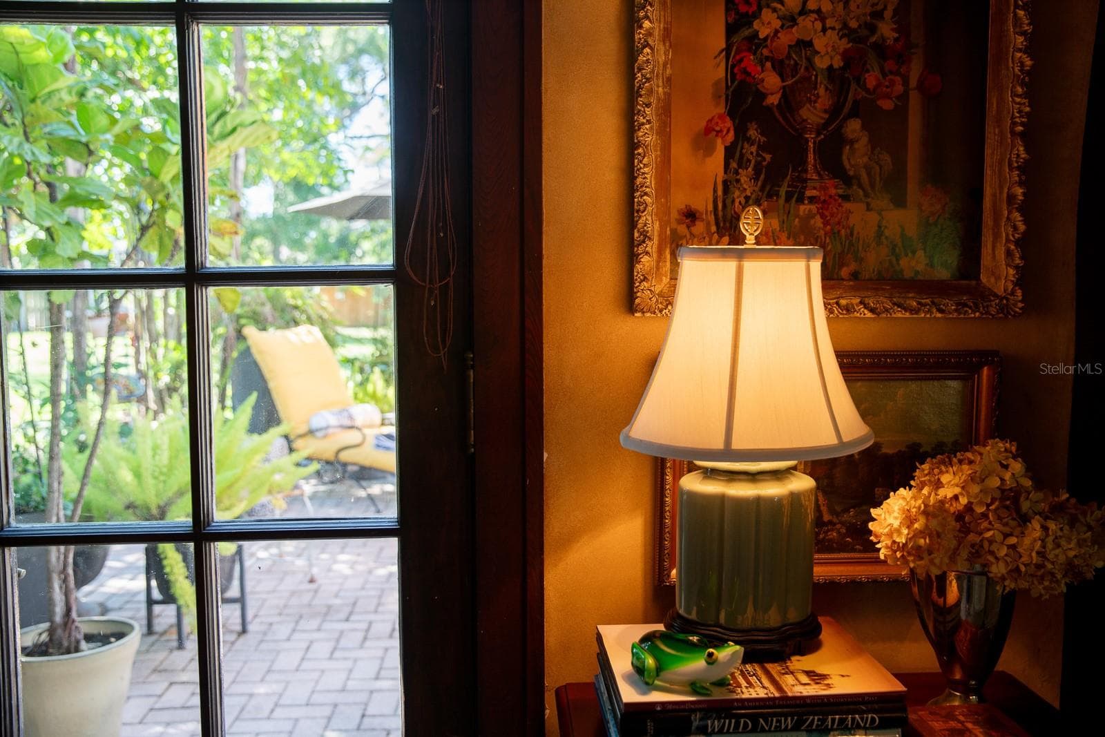 View from living room to courtyard. - 1230 ESTREMADURA DR, BRADENTON