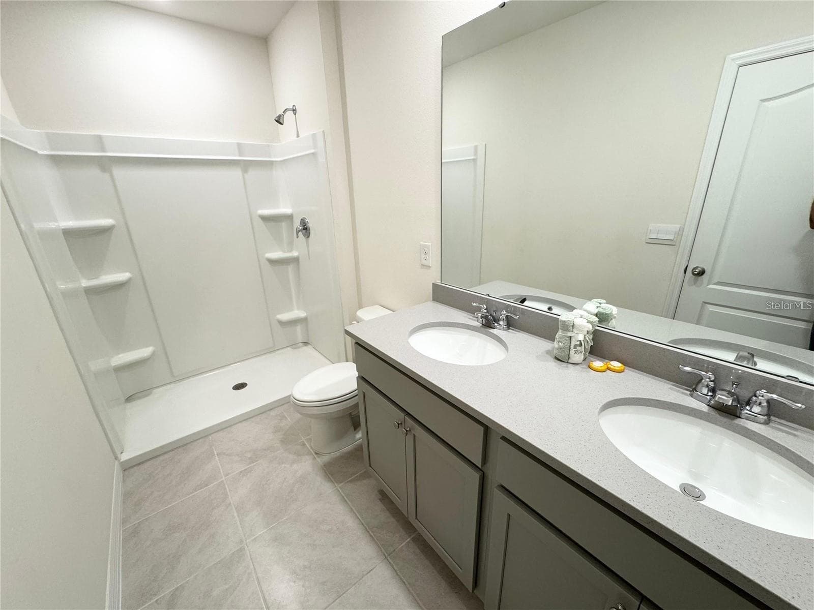 View of primary bathroom from entrance. - 2353 PENGUIN BLVD, DAVENPORT