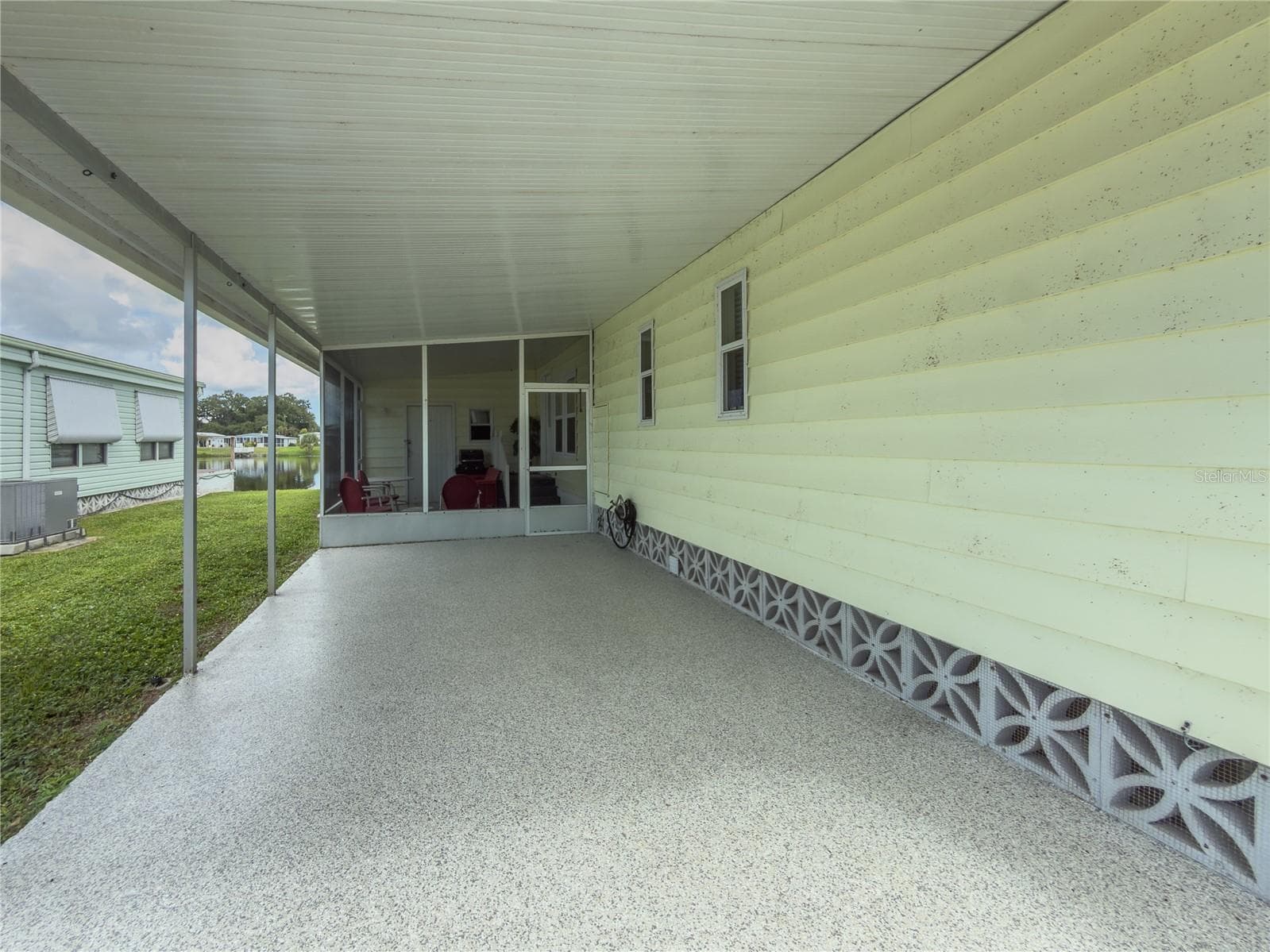 Carport with Screened in Patio - 808 53RD AVE E #169, BRADENTON