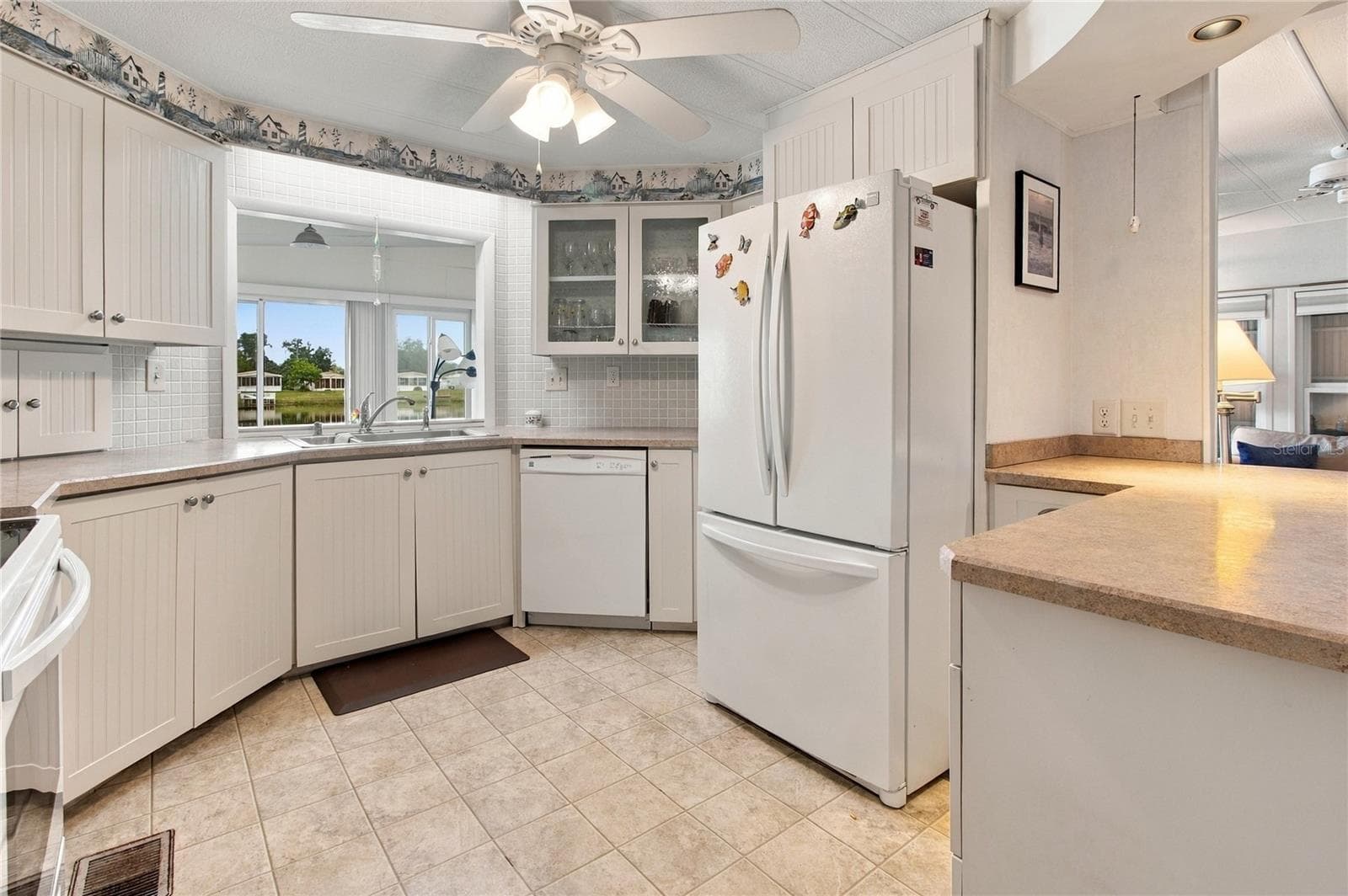 Kitchen with view of Lake - 808 53RD AVE E #169, BRADENTON