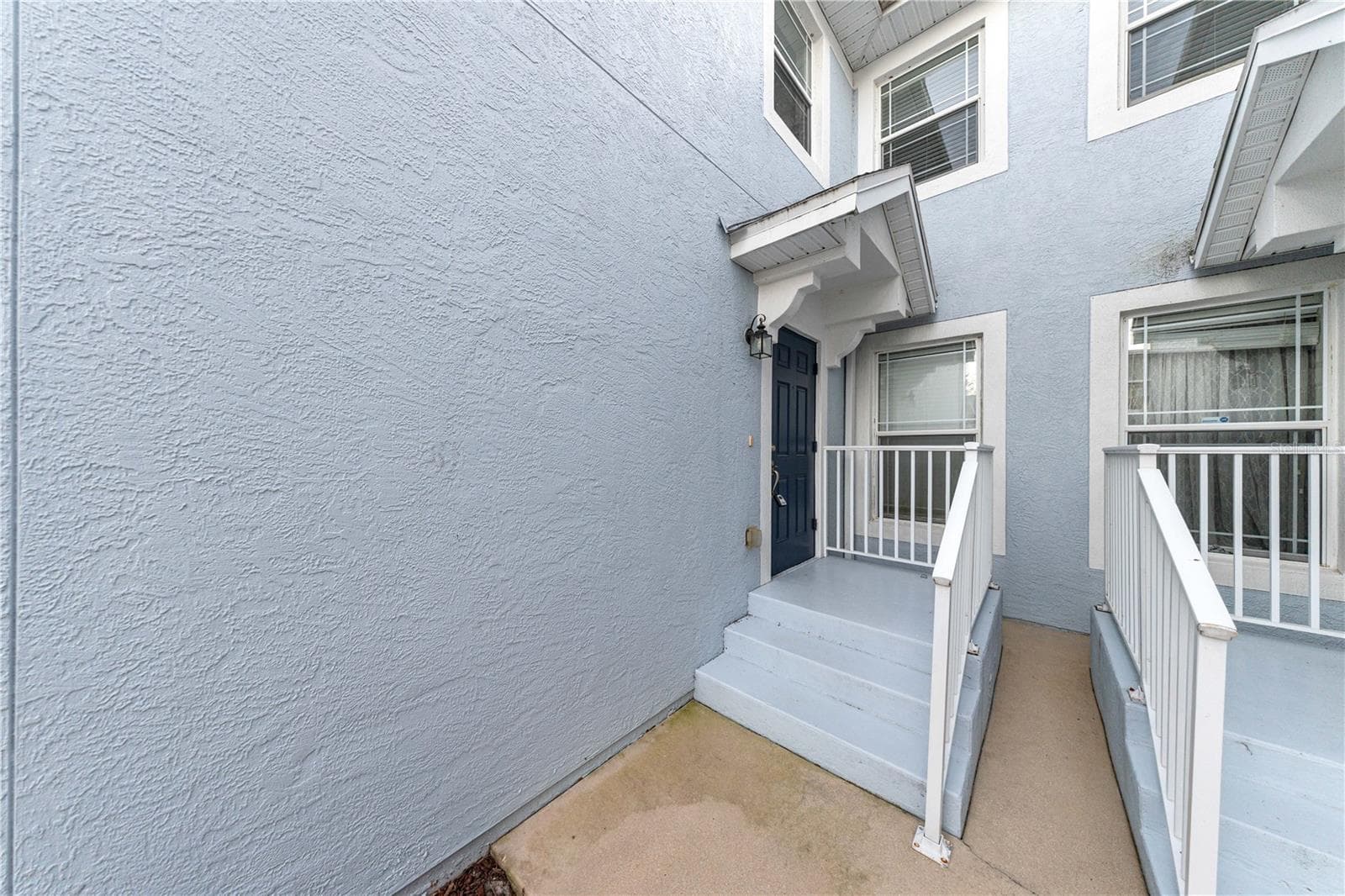Entryway steps - 4540 SW 52ND CIR #104, OCALA